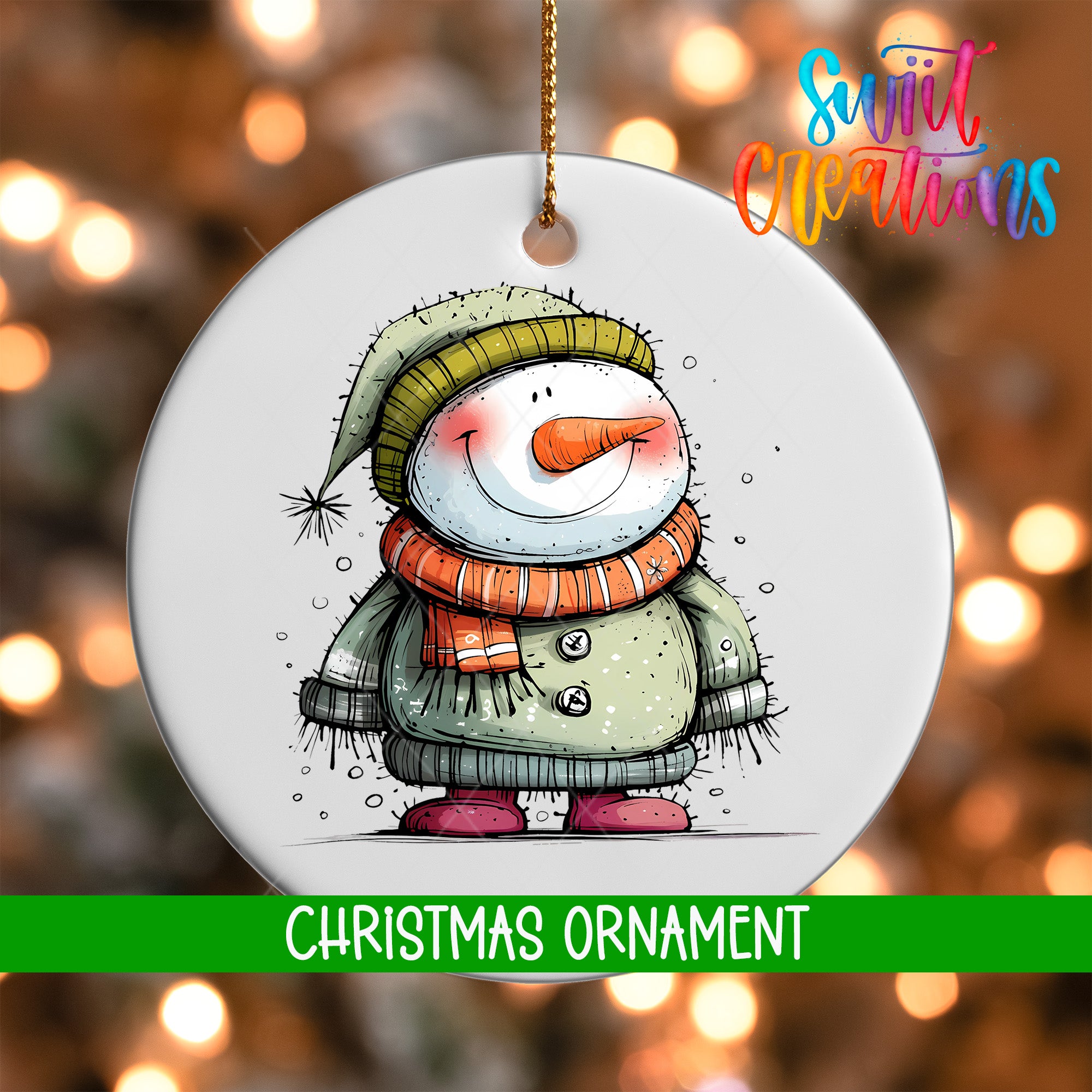 A white Christmas ornament featuring a smiling snowman wearing a green hat and scarf, with a red scarf and boots.
