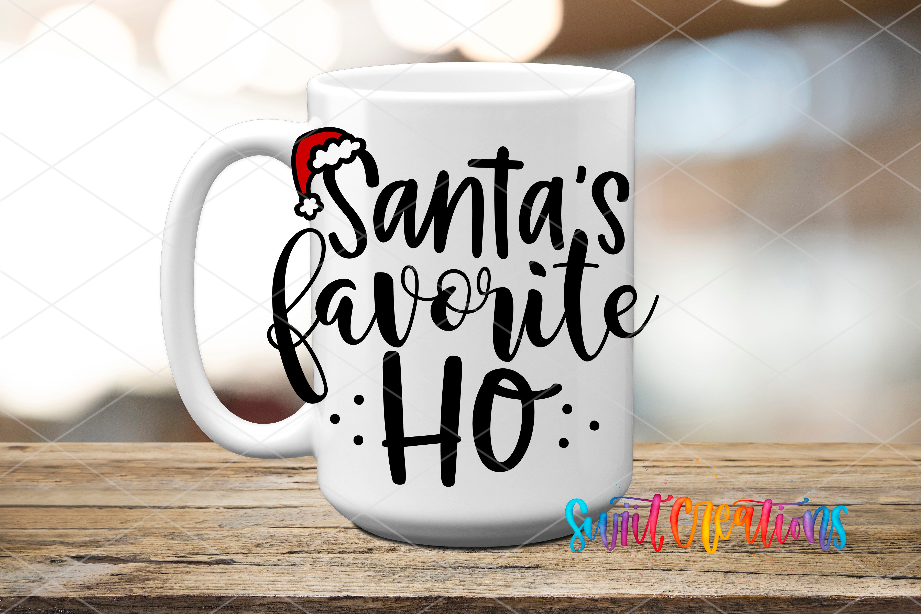 A white mug with the text "Santa's favorite ho" printed on it, along with a small Santa Claus hat icon.