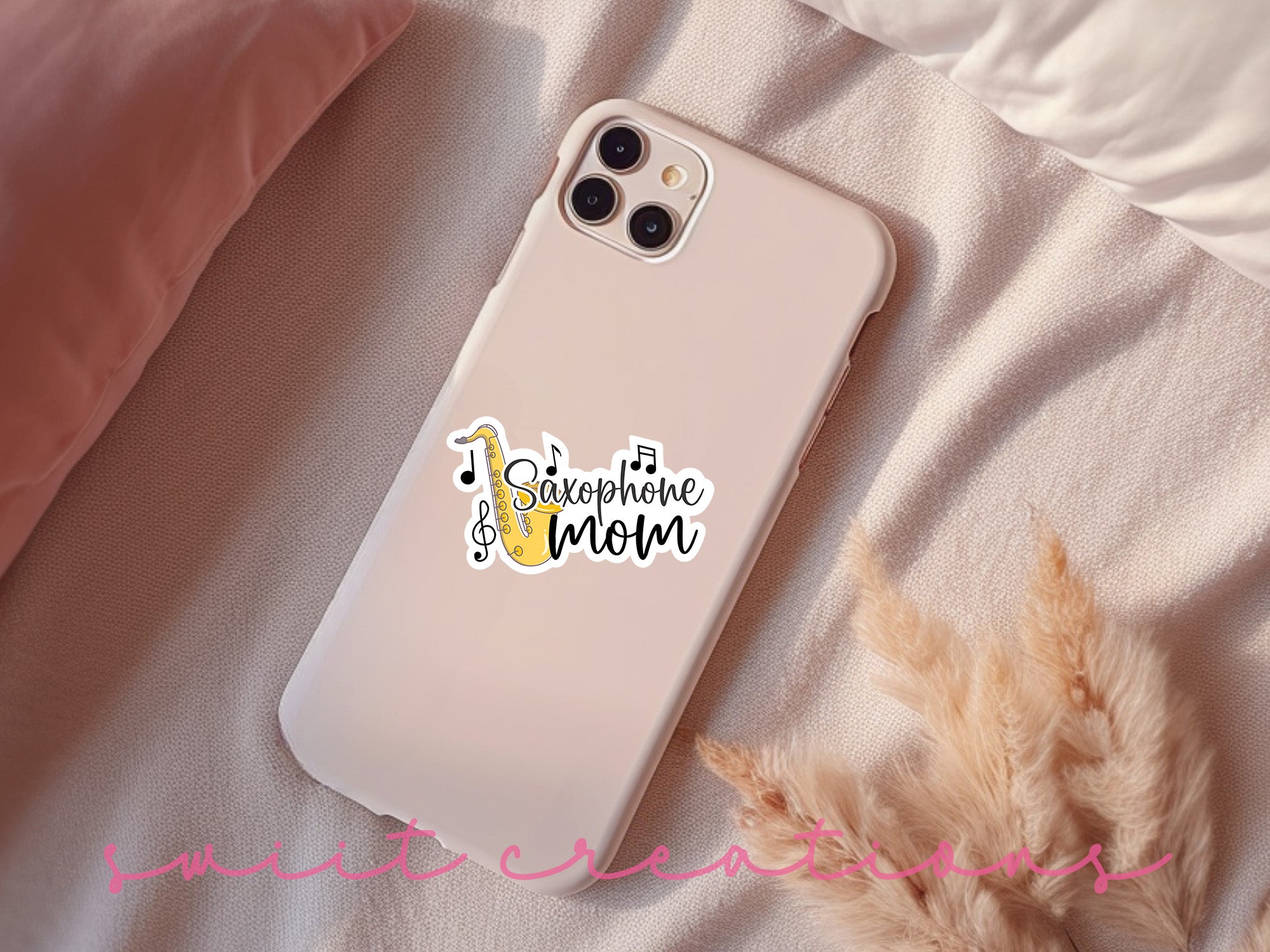 a phone case sitting on top of a bed