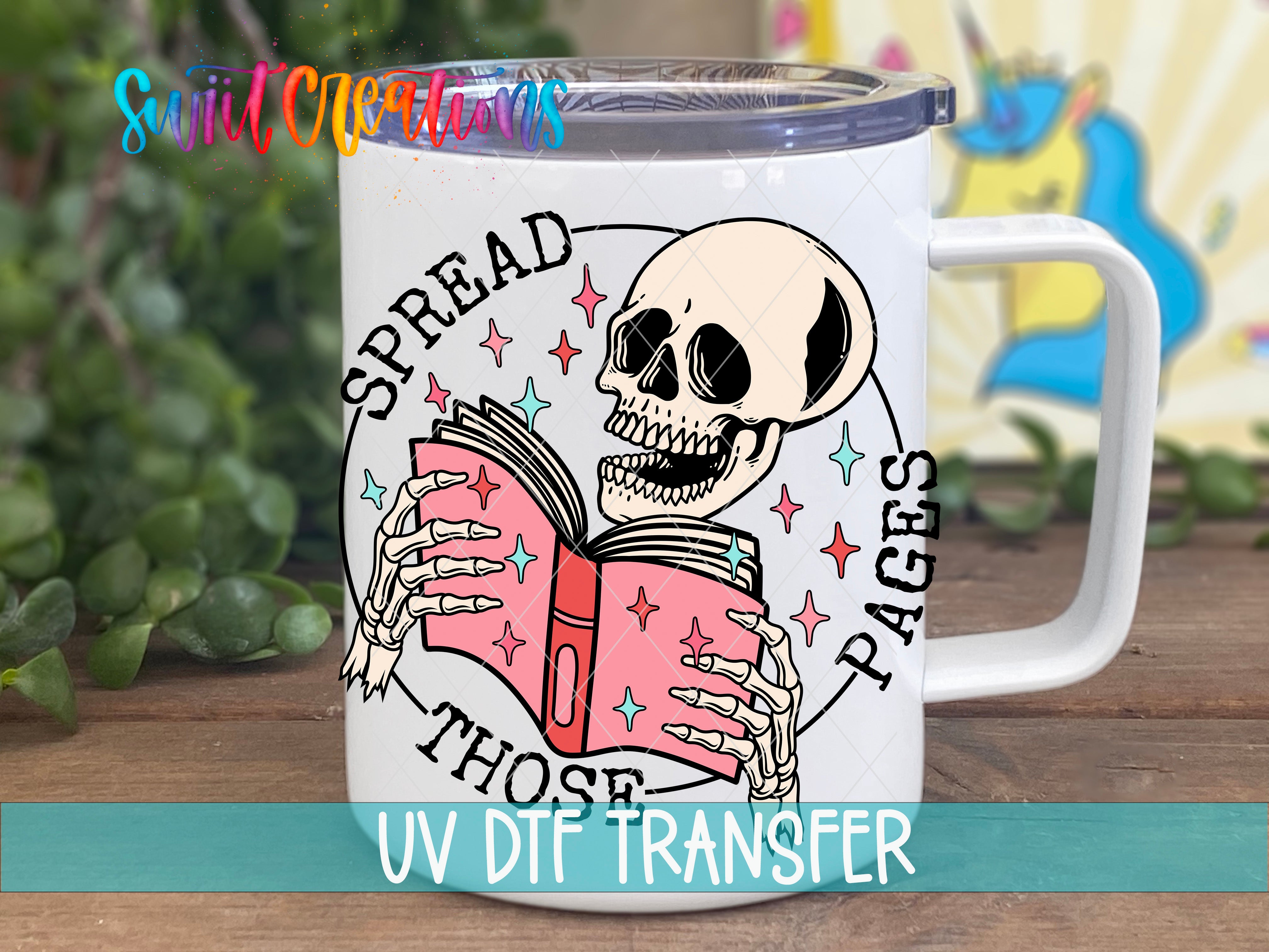 A white mug with a skull and crossbones design, holding a book and surrounded by colorful stars.