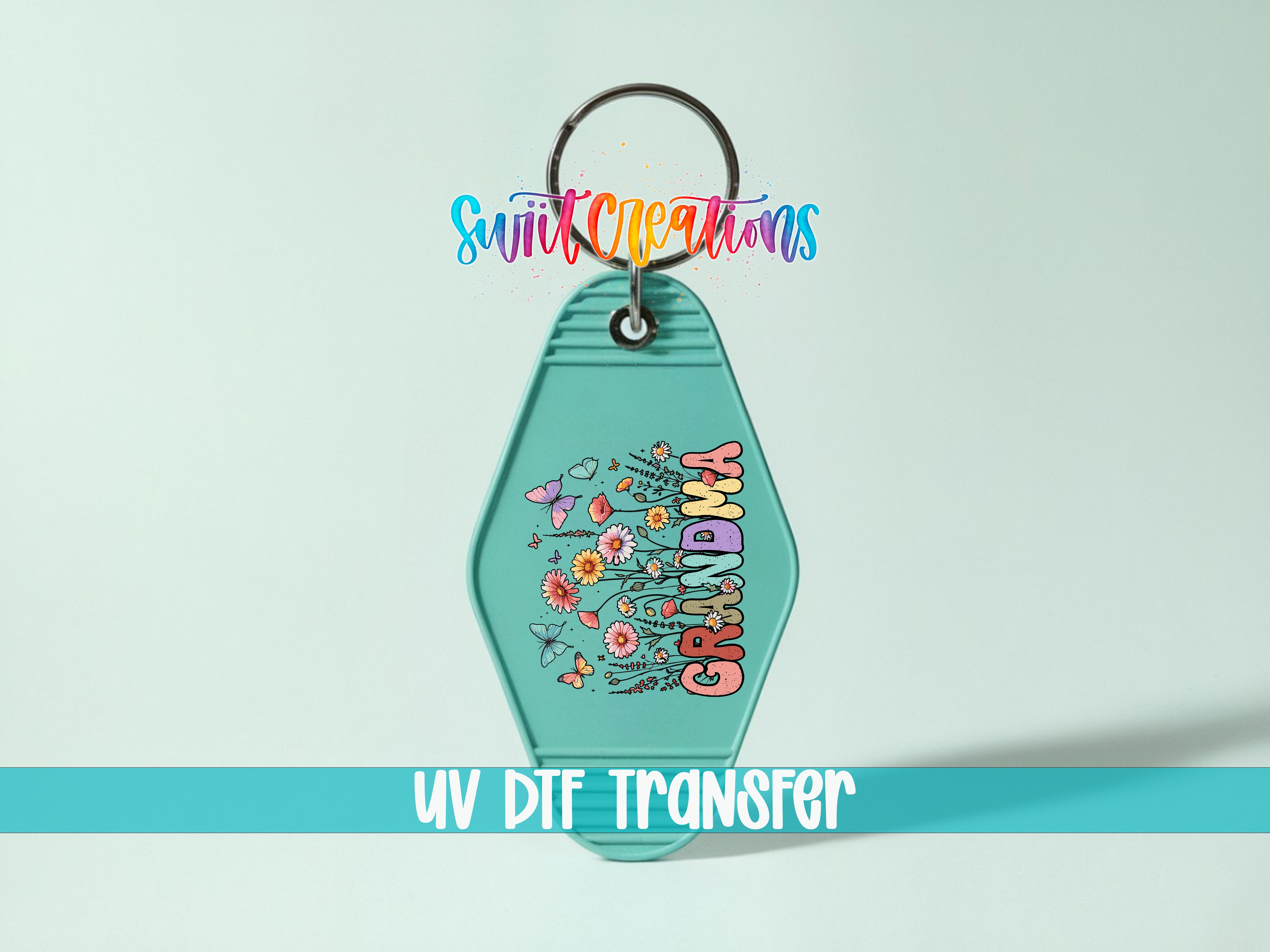A keychain with a colorful floral design and the text "GRANDMA" printed on it.