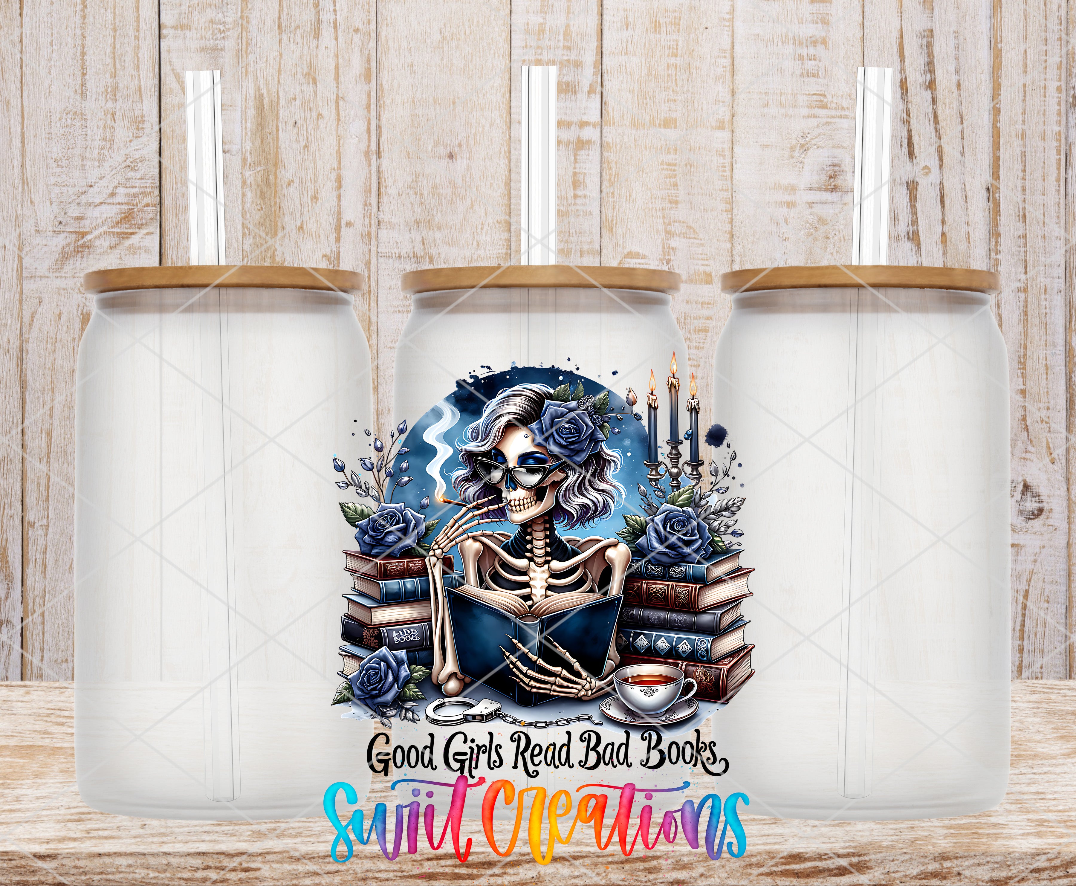 a skeleton with a book in its hands, surrounded by flowers and candles, with the text "Good girls read bad books" and "suiit creations" below.