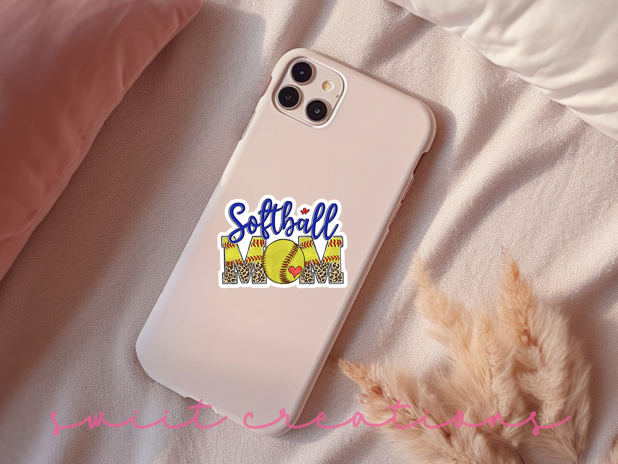 a cell phone case with softball on it