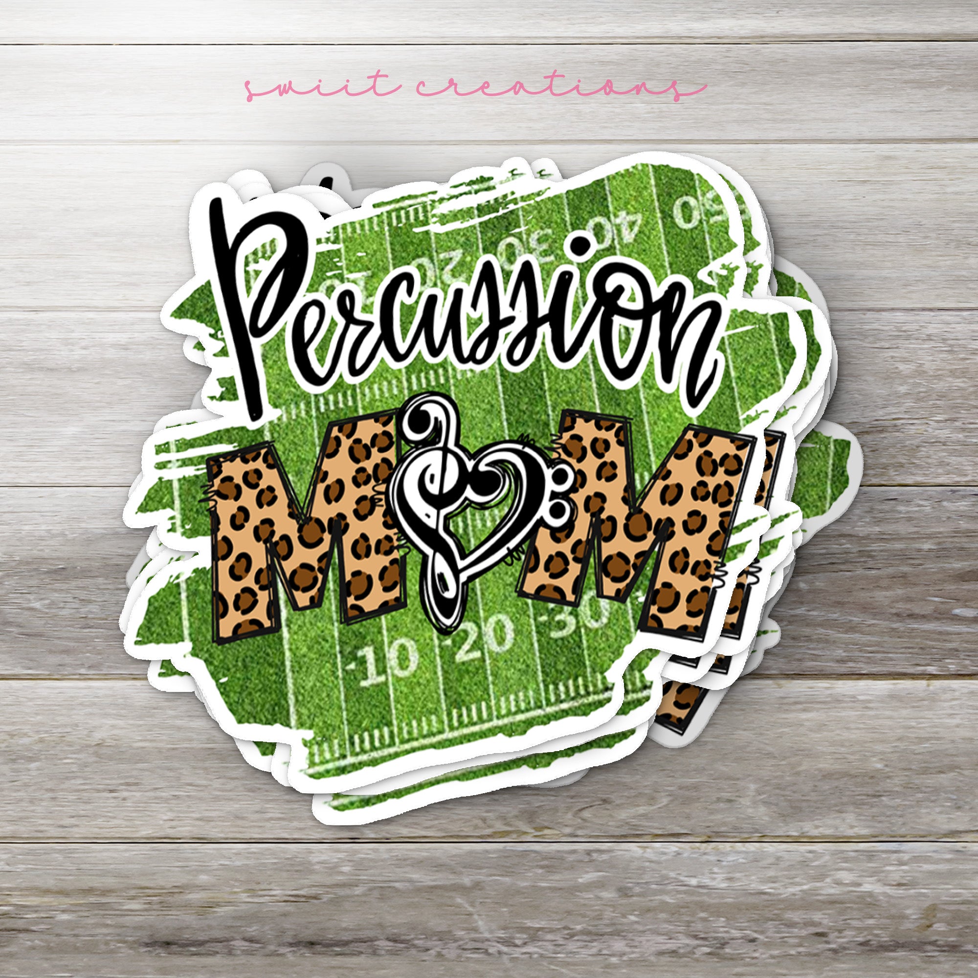 a sticker that says,'i am a football mom '