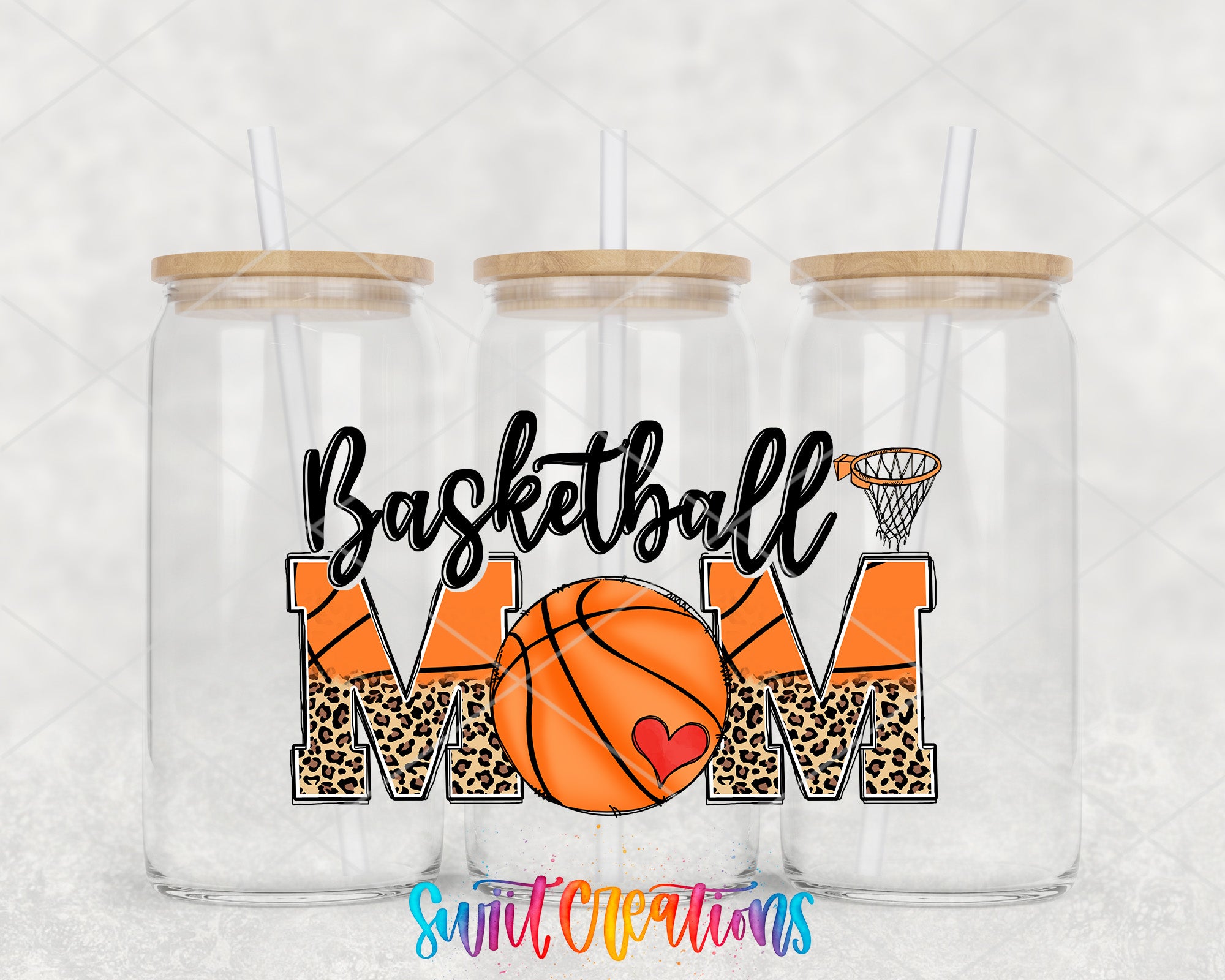 A collage of three glass jars with wooden lids, each containing a straw. The jars are arranged in a row, and the text "Basketball Mom" is displayed in a playful font, with a basketball graphic and a heart symbol.