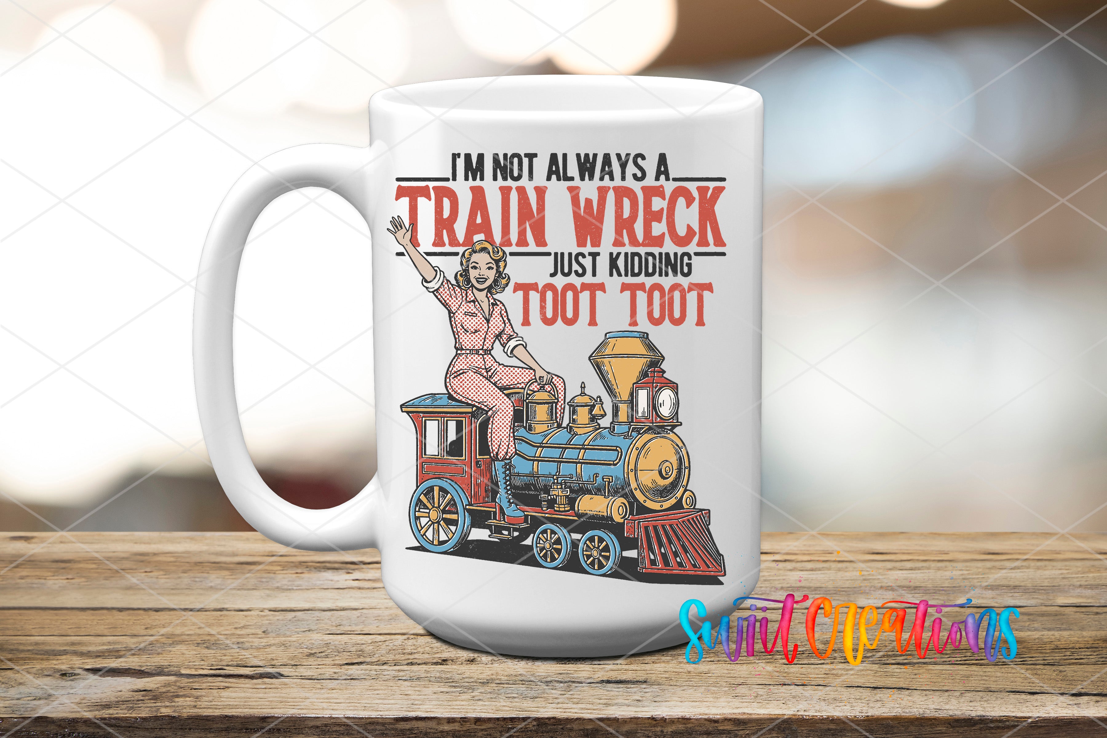 A white ceramic mug with a colorful illustration of a train and a woman on it, along with text that reads "I'm not always a train wreck just kicking toot toot".