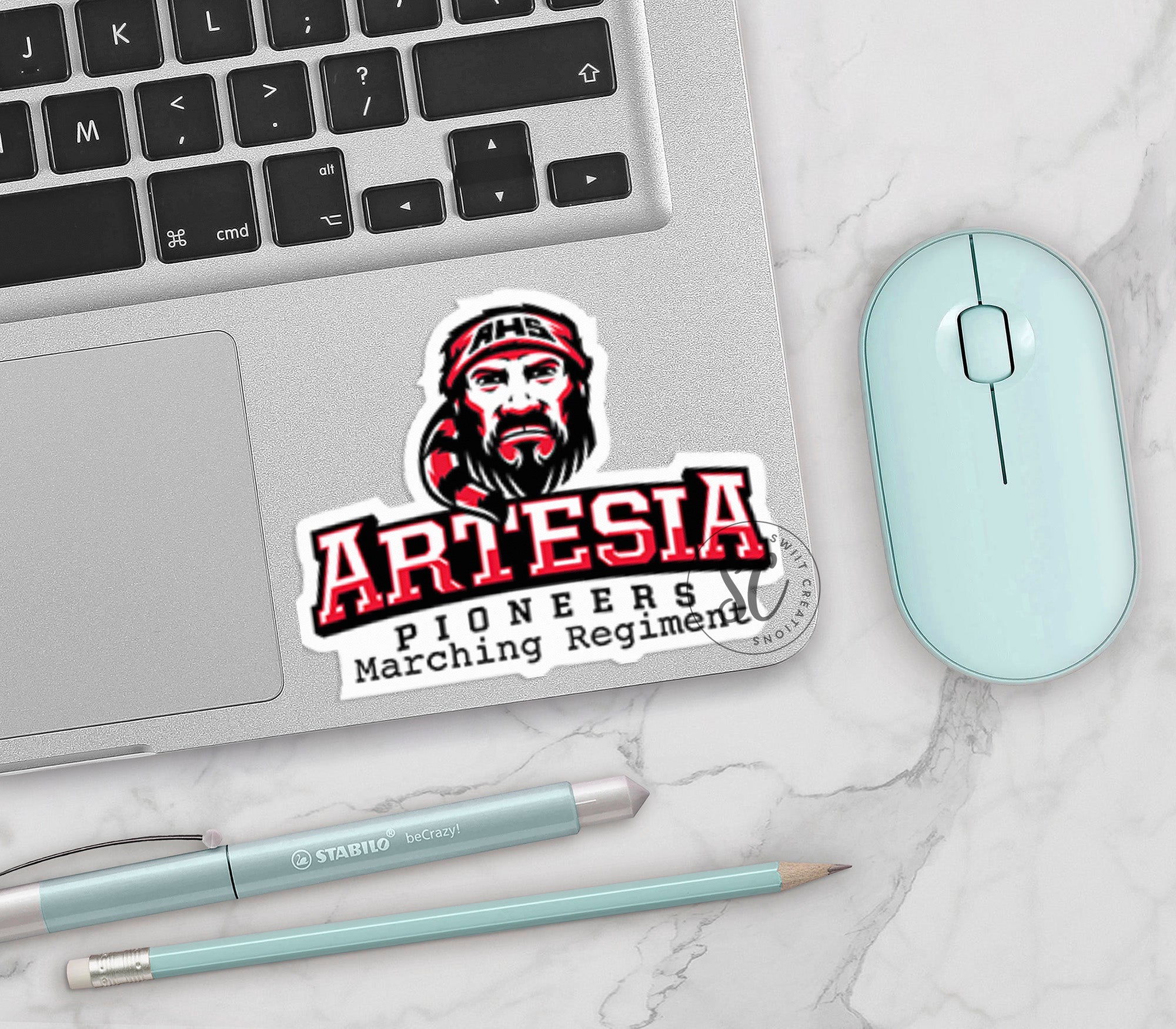 a sticker of a man with a beard on a laptop