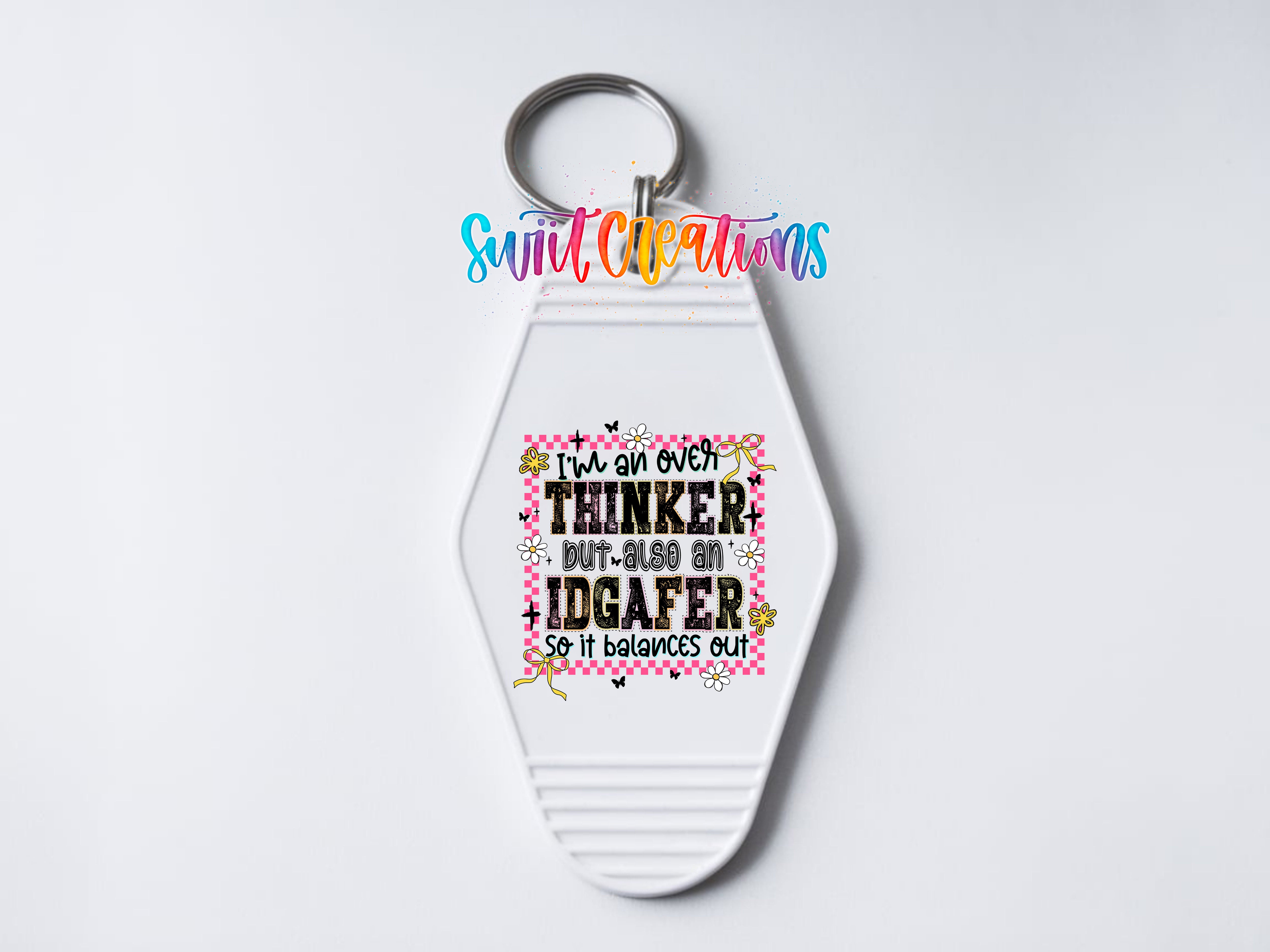 A keychain with a keyring and a colorful, decorative design on it.