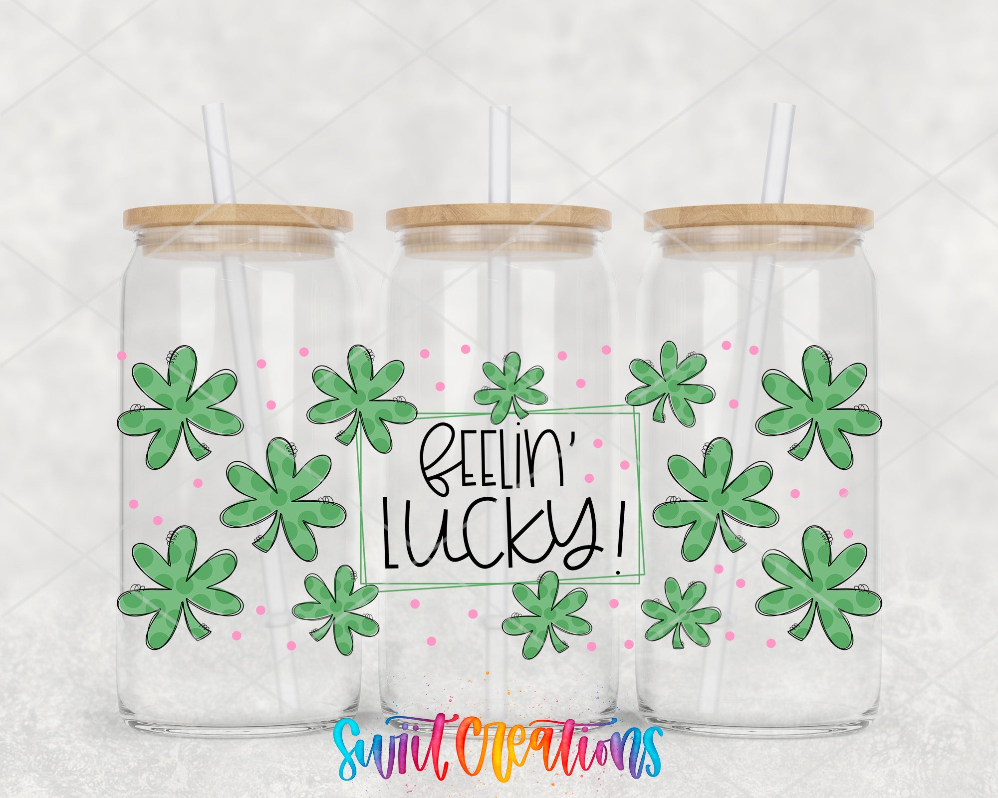 three glass tumblers with a leprechaun design and a message that says "Feelin' Lucky!"