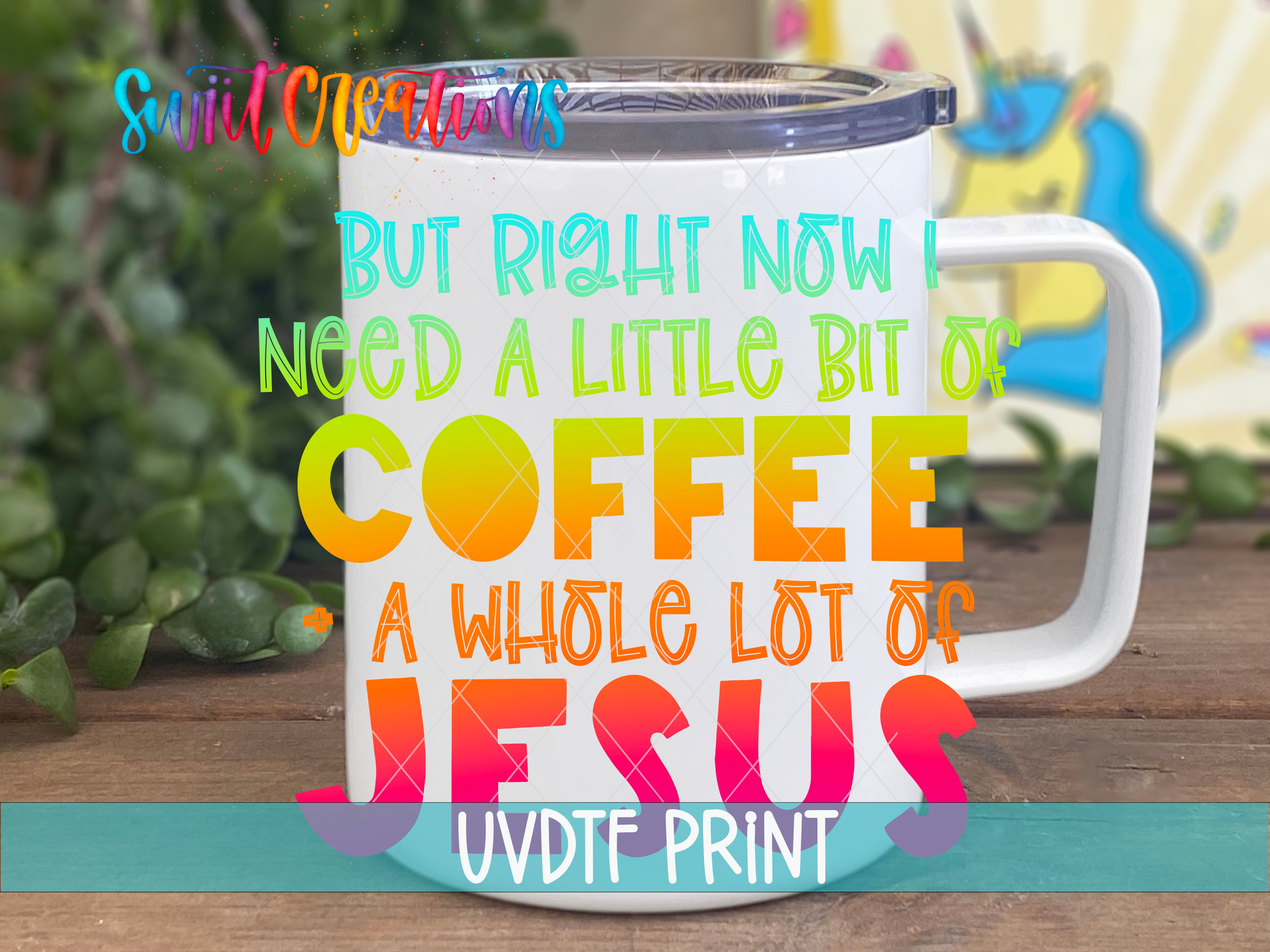 A white mug with colorful text on it, placed on a wooden surface.
