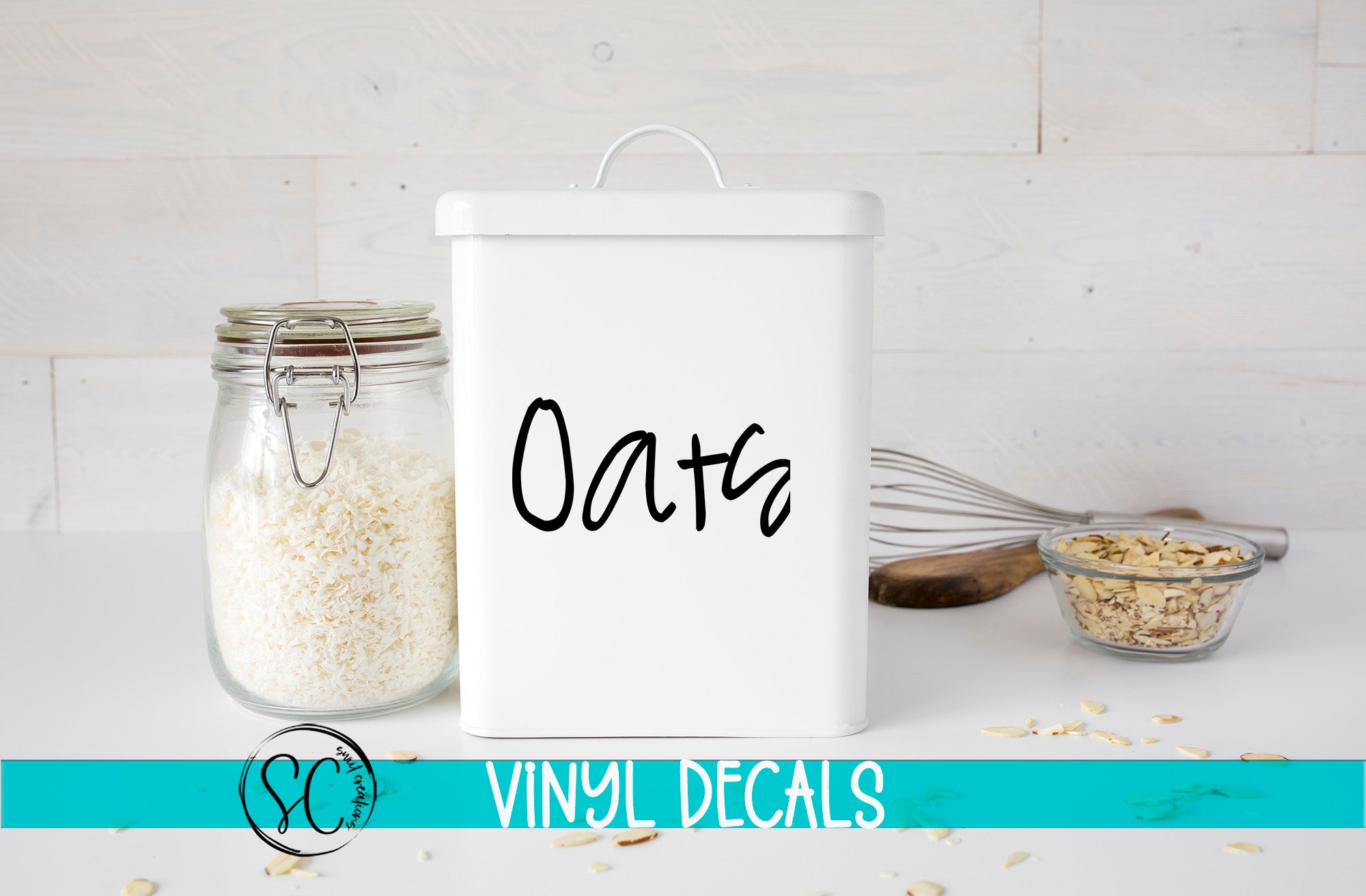 a white canister labeled "Oats" next to a glass jar filled with white grains, likely oats, and a small glass bowl containing more oats. The background is a white wooden surface with scattered oats.