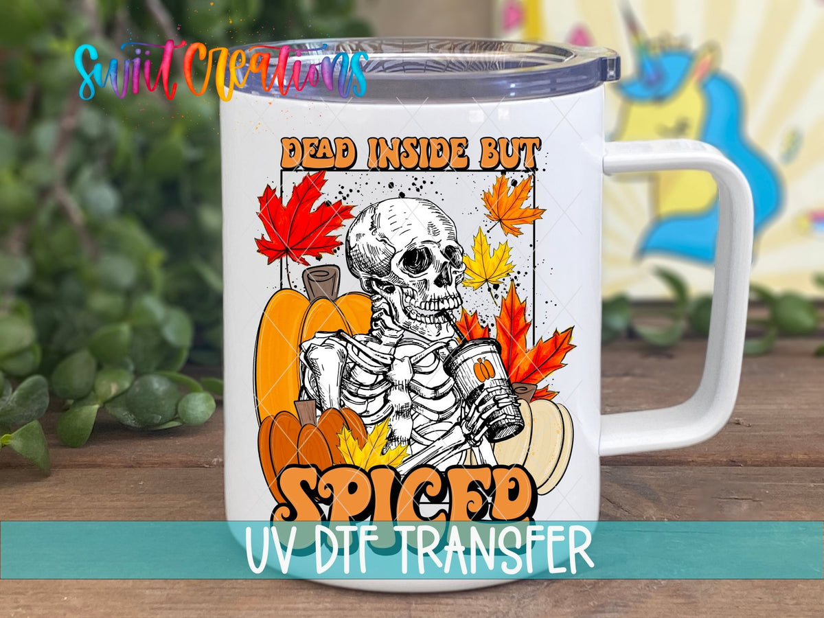 Dead Inside But Spiced Pumpkin Skeleton UV DTF transfer displayed on a white coffee mug from Swiit Creations
