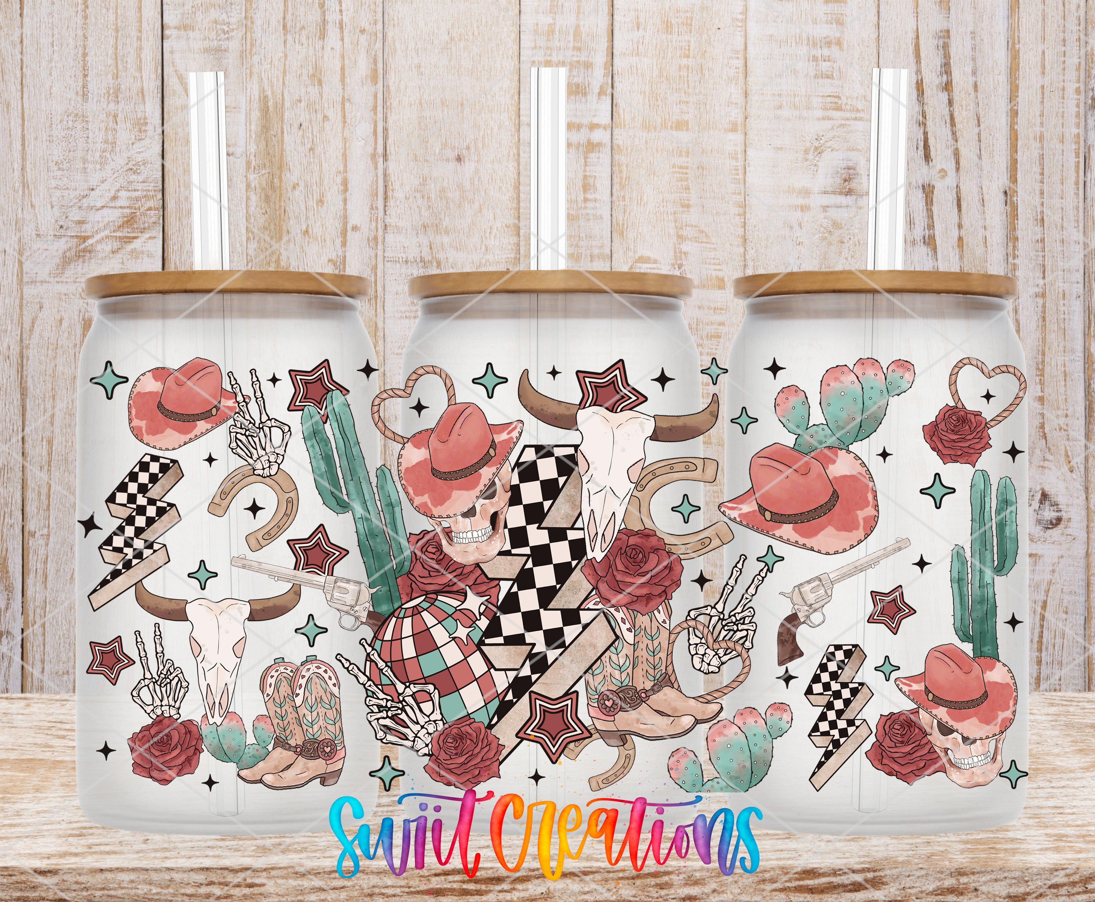 three white tumblers with colorful designs and illustrations of various western-themed elements, such as cacti, horses, and cowboy hats.