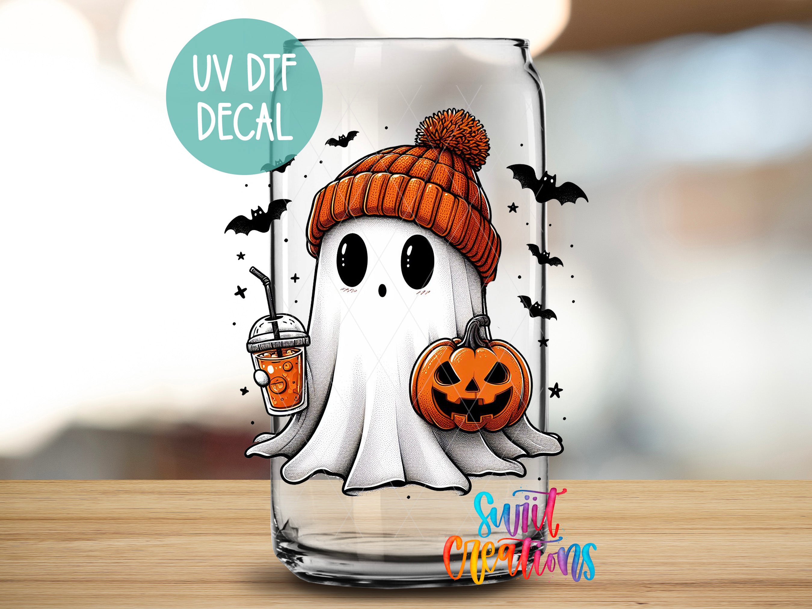 A Halloween-themed glass jar with a ghost wearing a hat and holding a pumpkin, surrounded by bats and stars.