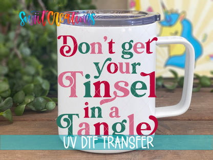 Swiit Creations UV DTF Don’t Get Your Tinsel In A Tangle transfer displayed on a white coffee mug