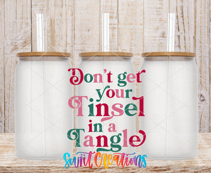 Swiit Creations UV DTF Don’t Get Your Tinsel In A Tangle transfer shown on a clear glass can set