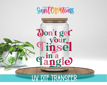 Swiit Creations UV DTF Don’t Get Your Tinsel In A Tangle transfer displayed on a clear jar mockup