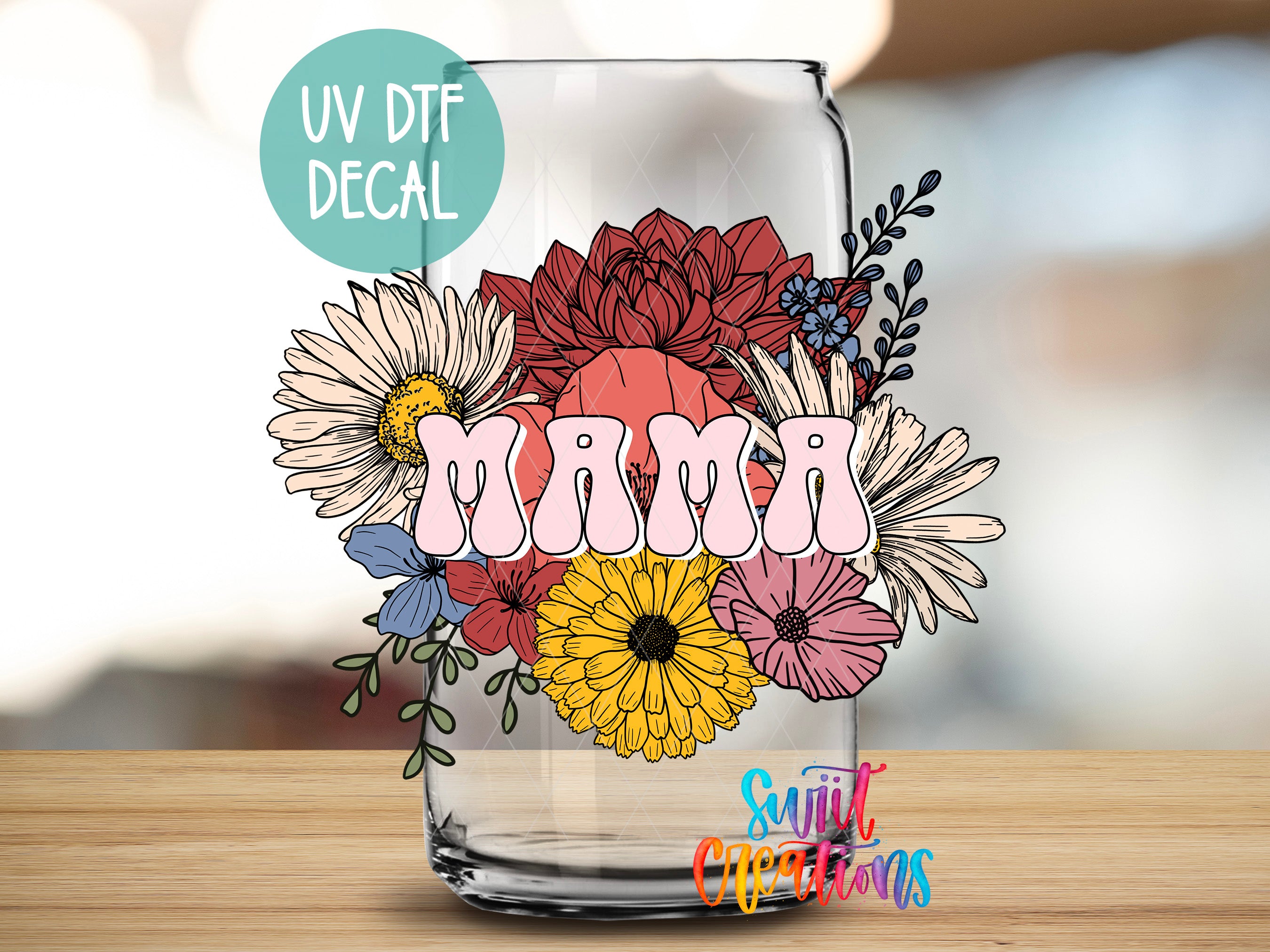 a clear glass with flowers and the word mama on it