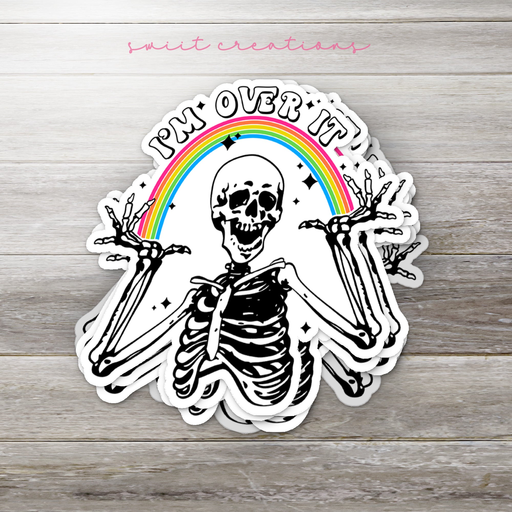 a sticker of a skeleton with a rainbow in the background