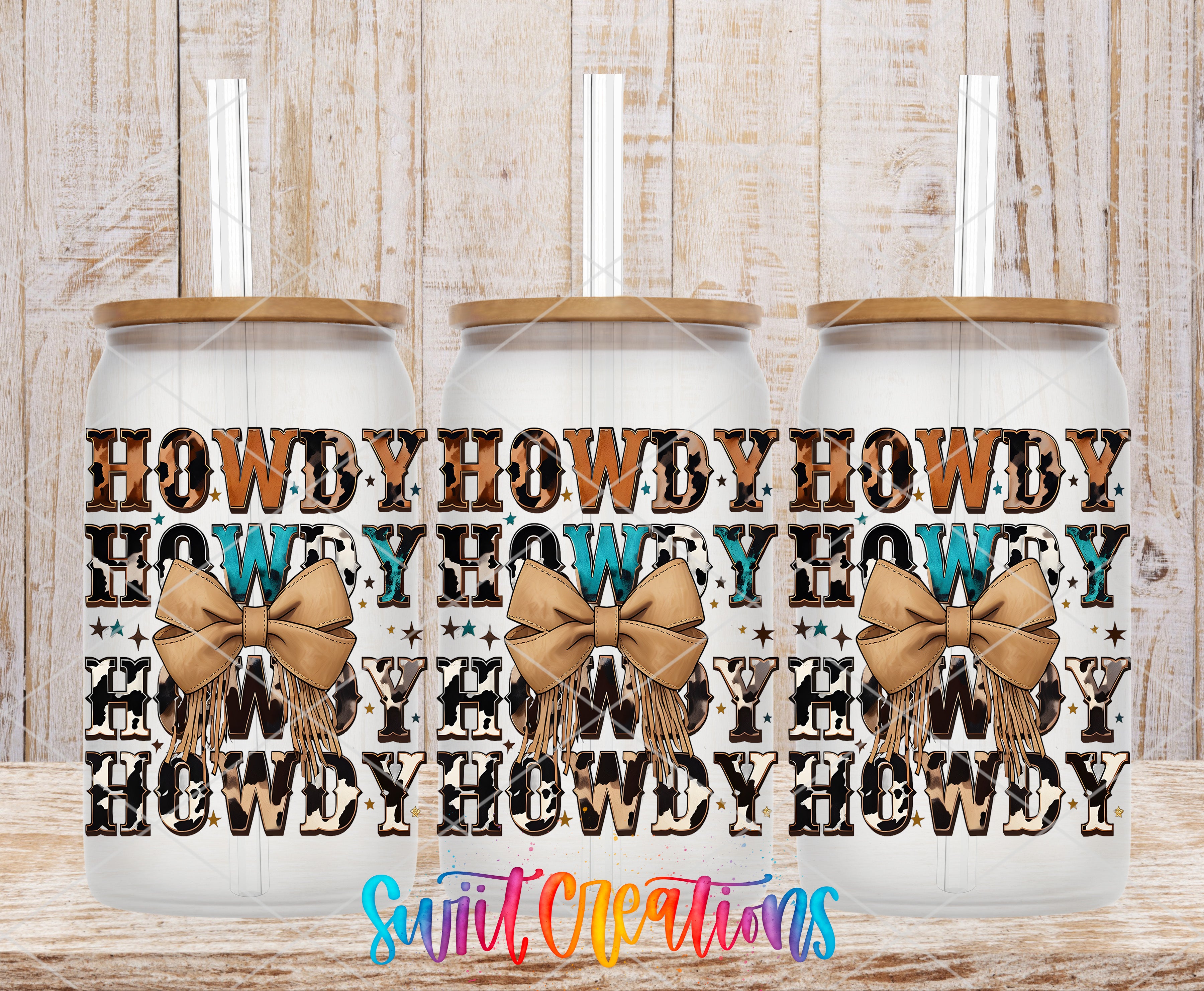 Three glass tumblers with a cowboy-themed design, featuring the text "HOWDY HOWDY HOWDY" and decorative bows.
