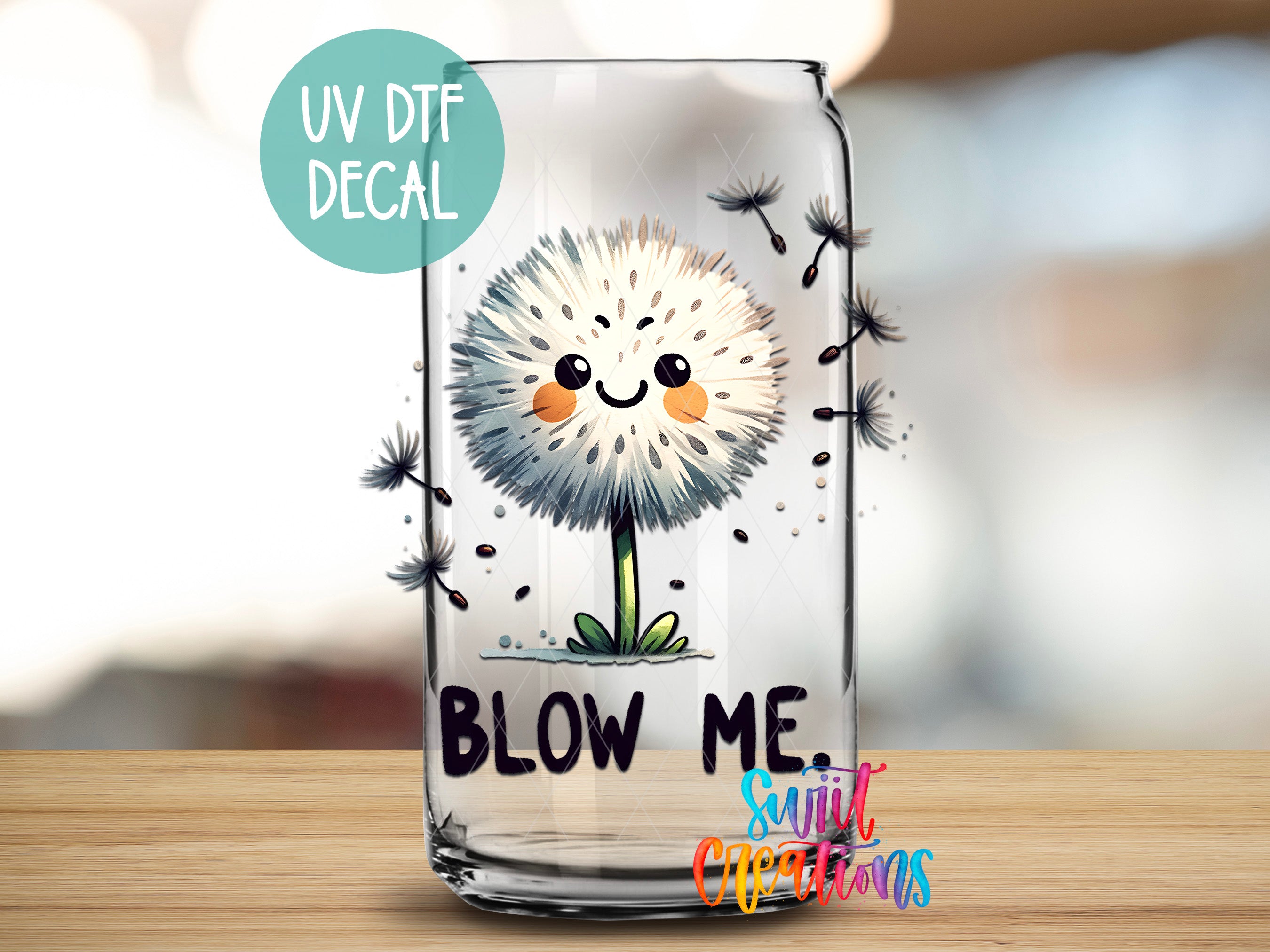 A glass jar with a cartoon dandelion design and the text "BLOW ME" printed on it.