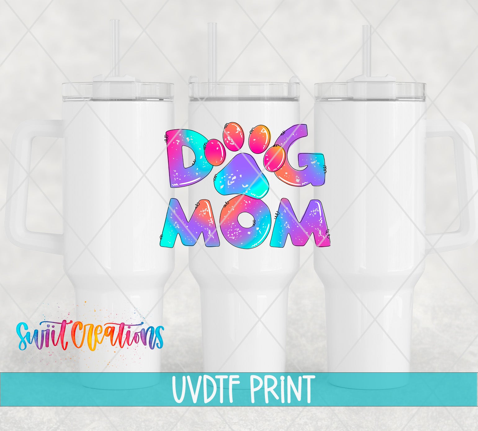 a white tumbler with a colorful design that says "DOG MOM" in a vibrant, rainbow-colored font.