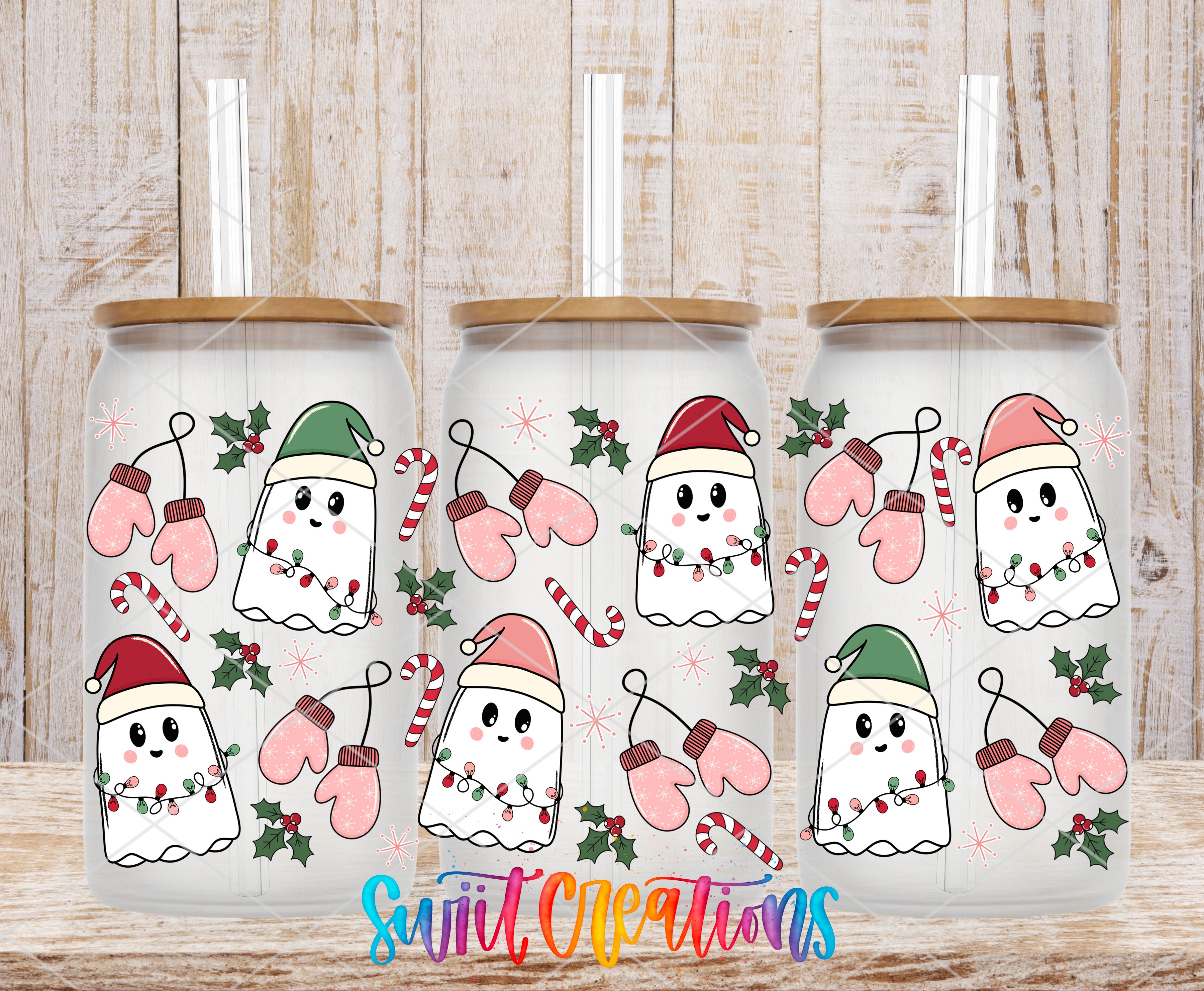 three glass tumblers with a festive holiday design, including ghostly figures, Santa hats, mittens, and Christmas decorations such as holly and candy canes.