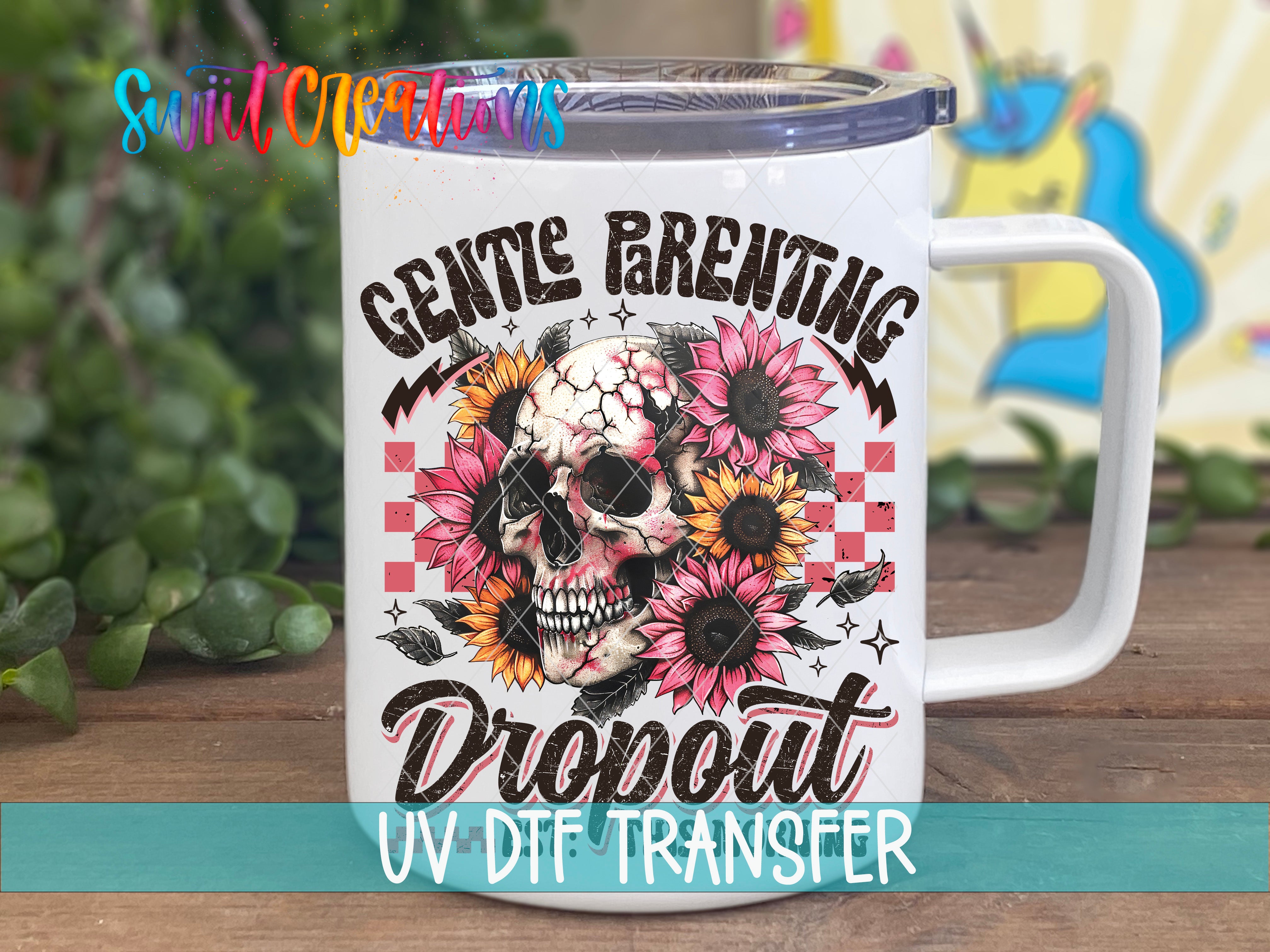 A white mug with a skull design and colorful sunflowers on it, along with the text "GENTLE PARENTING DROPOUT" printed on it.