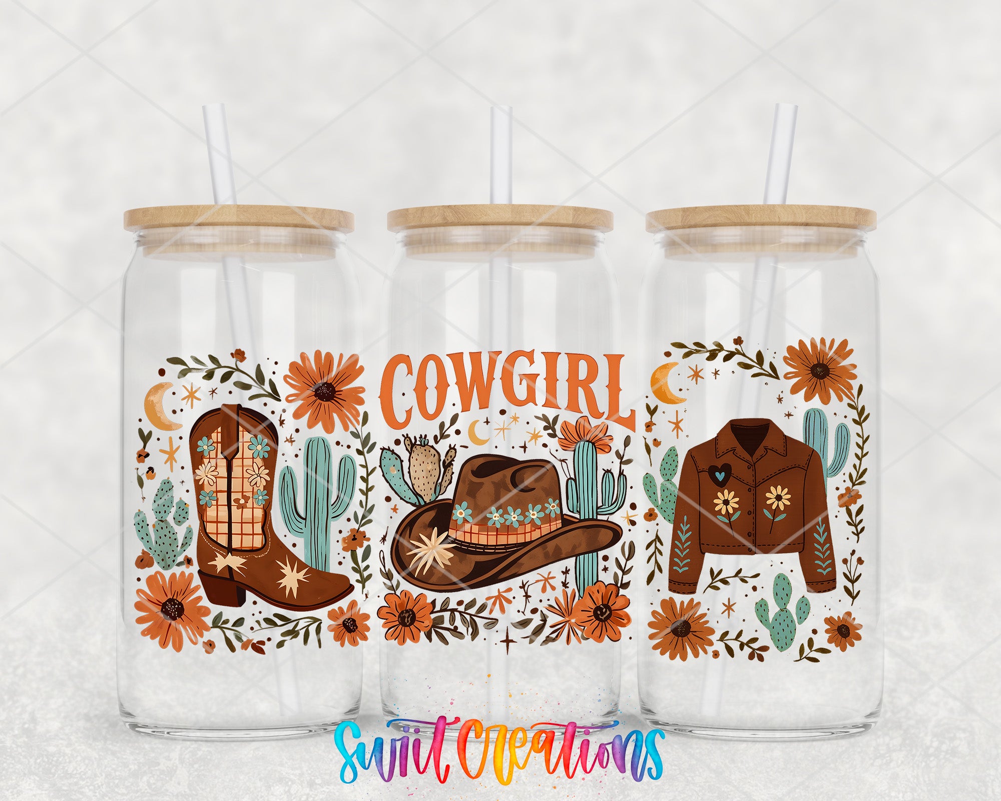 three glass tumblers with a cowboy theme, each adorned with illustrations of cowboy boots, cacti, and flowers. The word "COWGIRL" is prominently displayed on the tumblers, indicating the theme of the design.