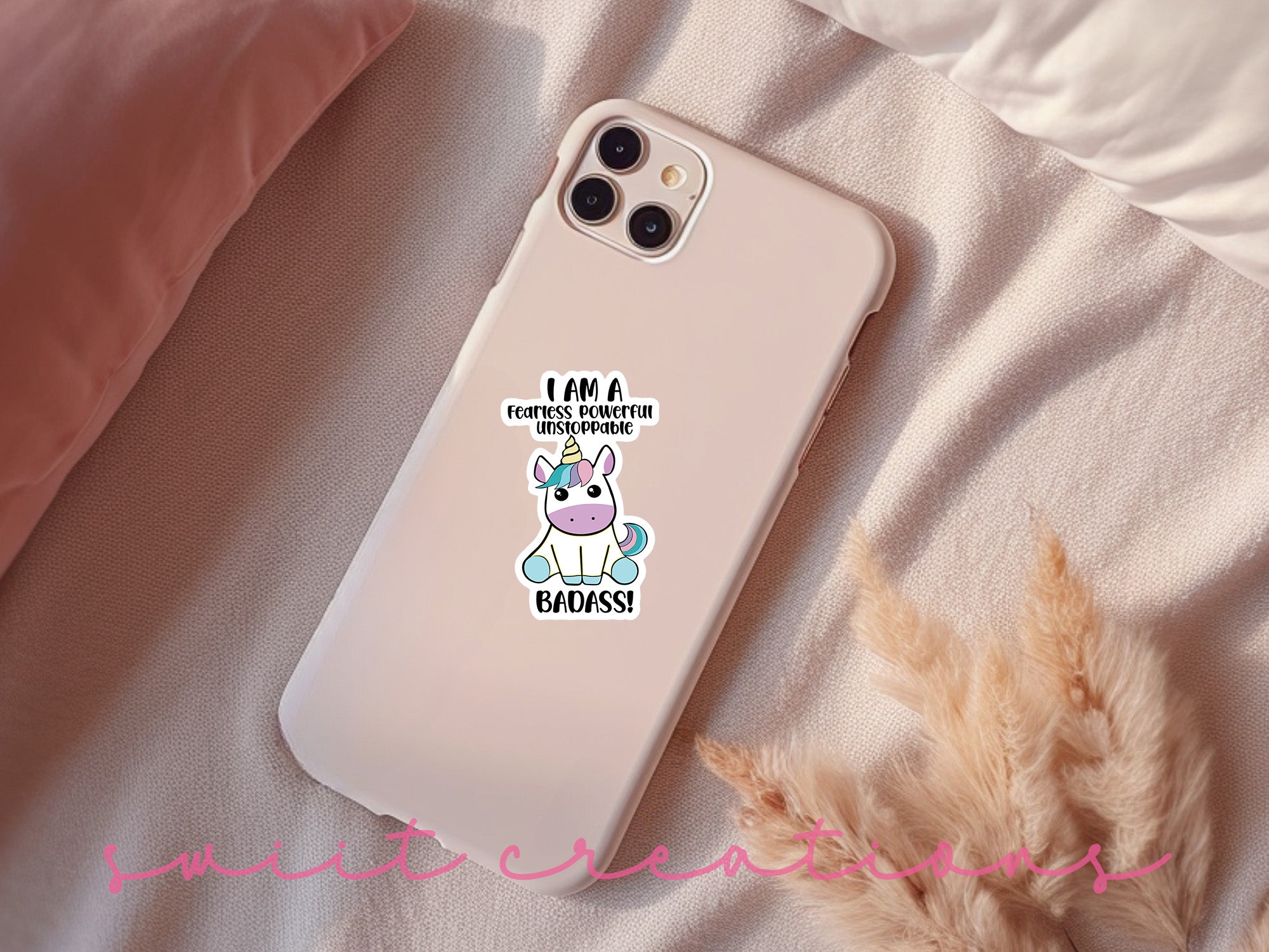 a phone case with a unicorn sticker on it