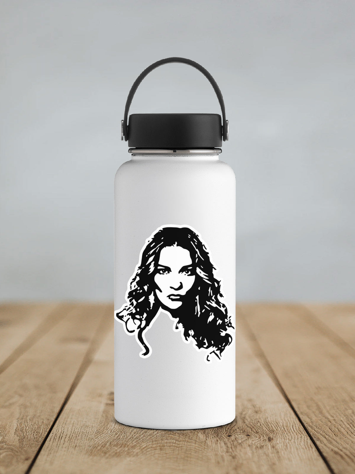 a water bottle with a picture of a woman on it