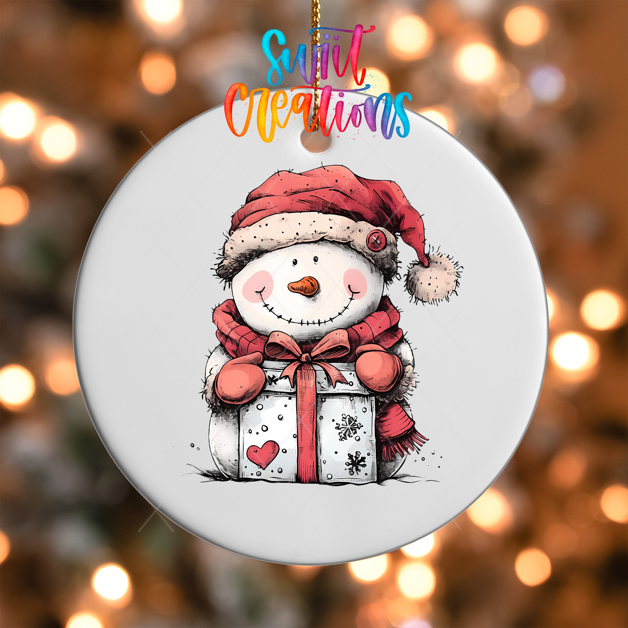 A snowman ornament with a gift box, wearing a red hat and scarf, is hanging against a background of colorful lights.