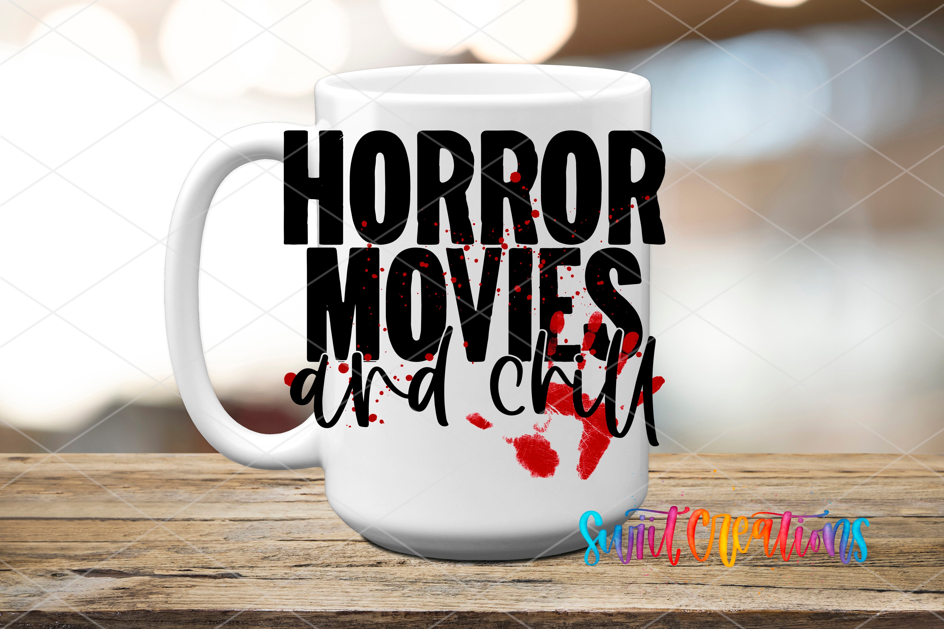 A white mug with the text "HORROR MOVIES and chill" printed on it, along with a red splatter effect.