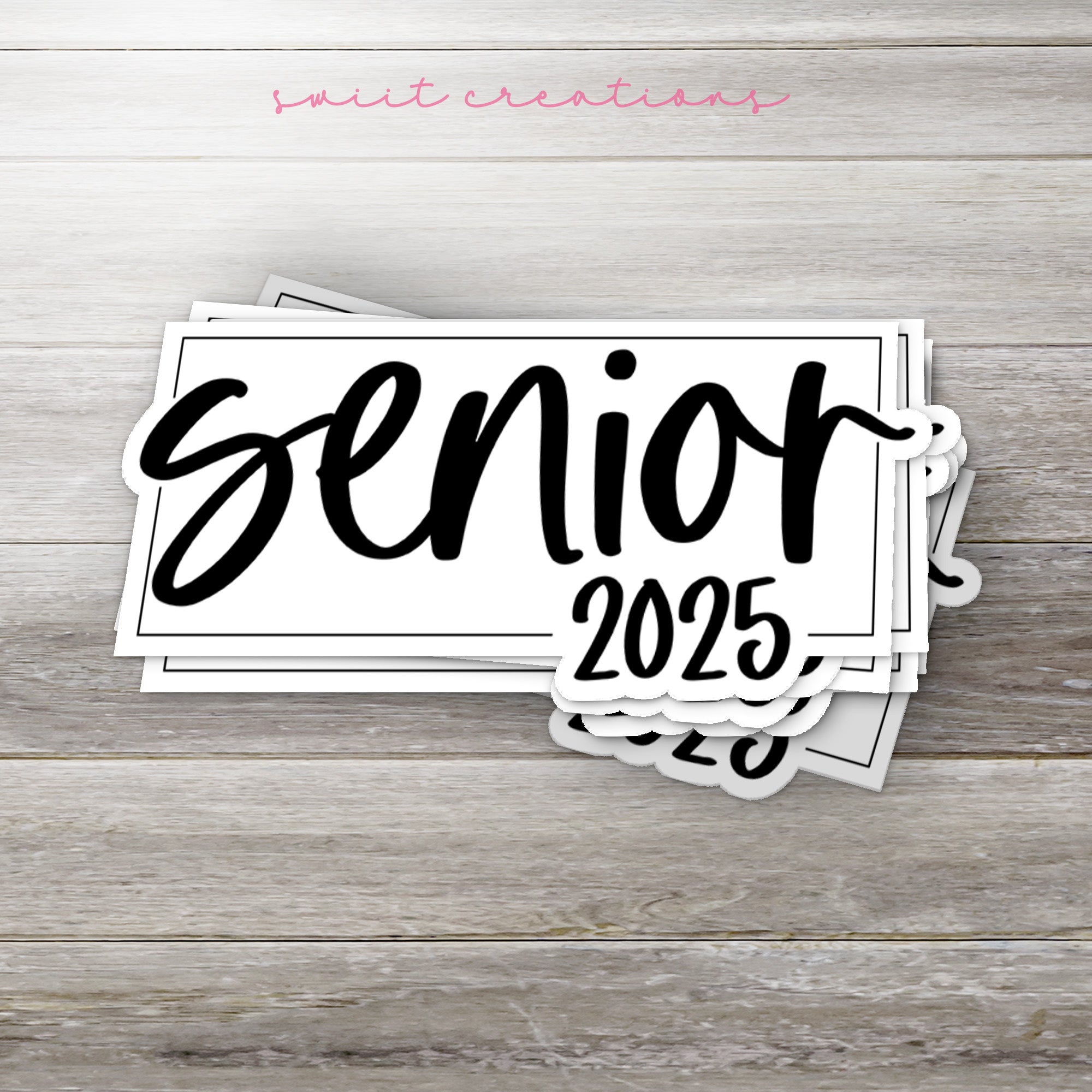 a bunch of stickers sitting on top of a wooden table