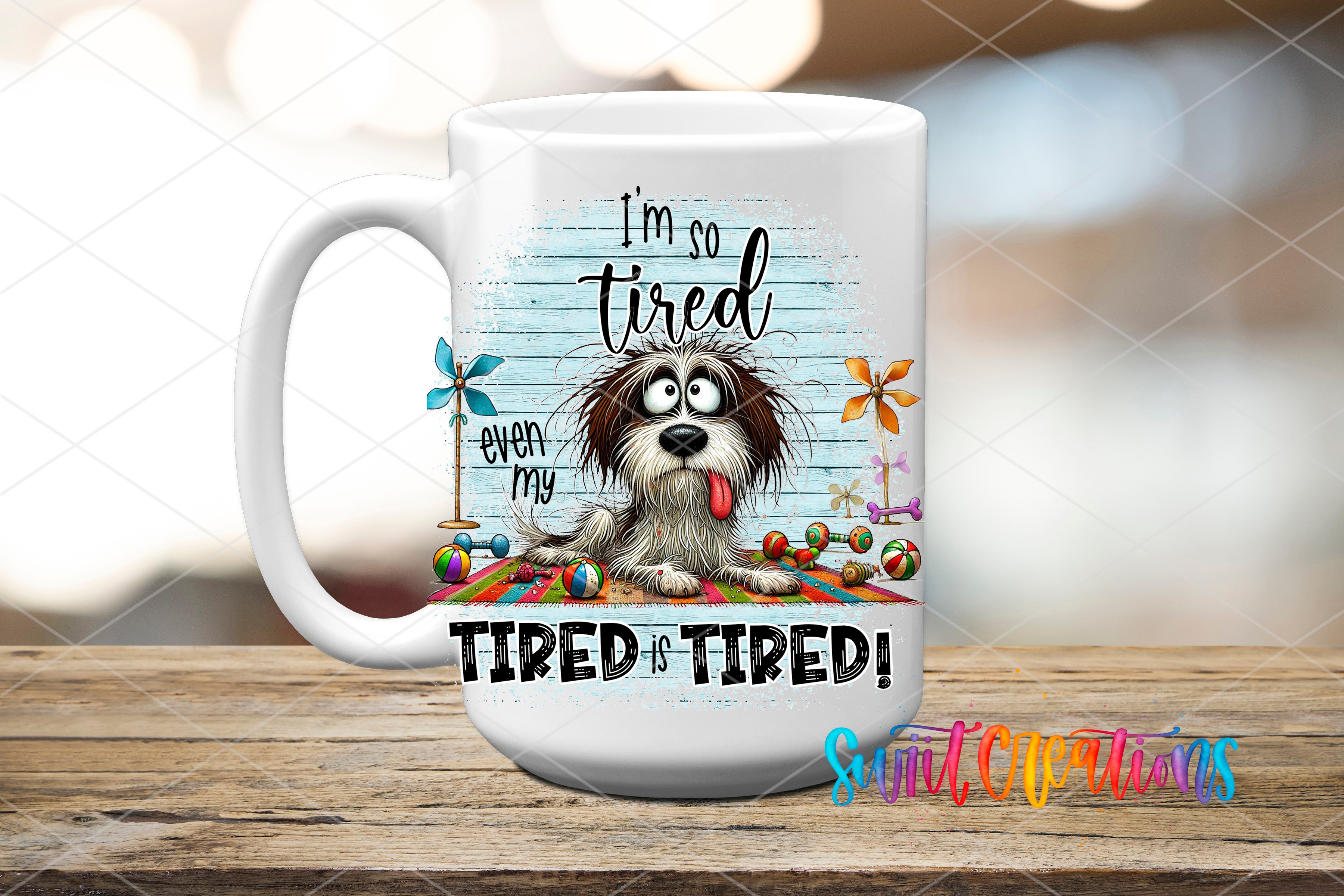 A white mug with a cartoon image of a dog and the text "I'm so tired even my dog is tired!" printed on it.