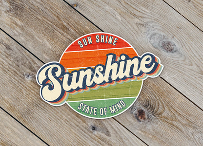 a sticker that says sunshine state of mind on a wooden surface