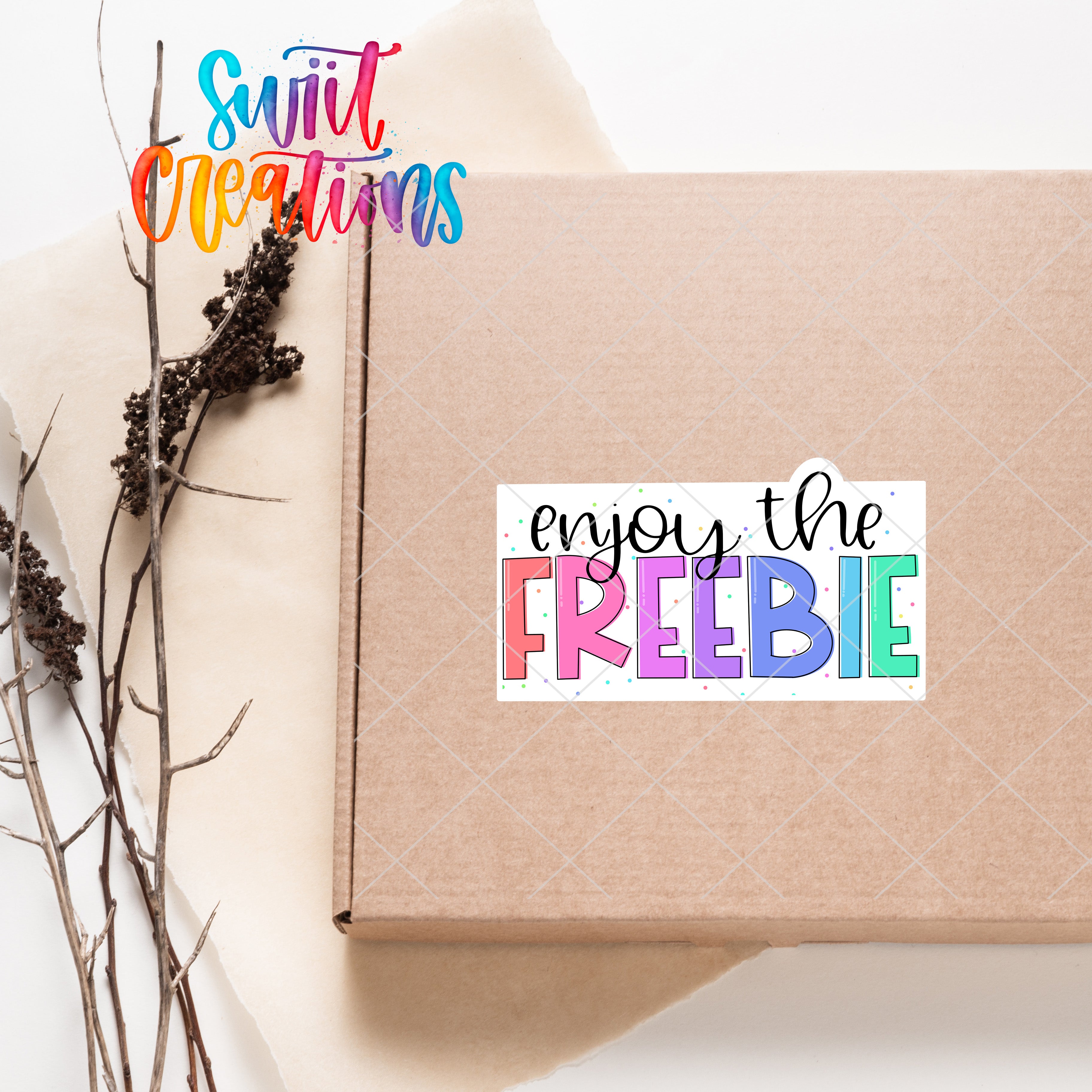 a box with a sticker that says enjoy the freebie