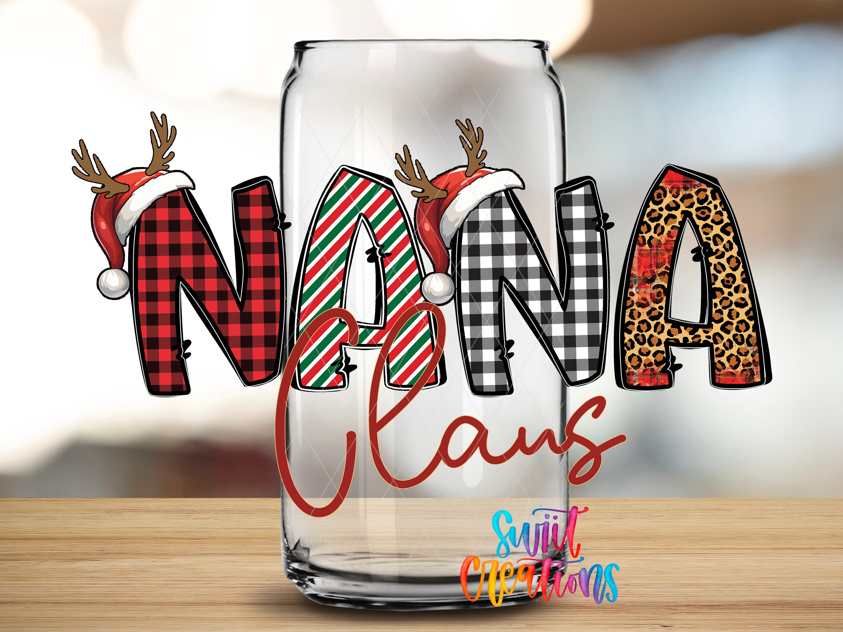 A glass can with the word "NANA" written on it, along with decorative elements such as reindeer and leopard patterns.