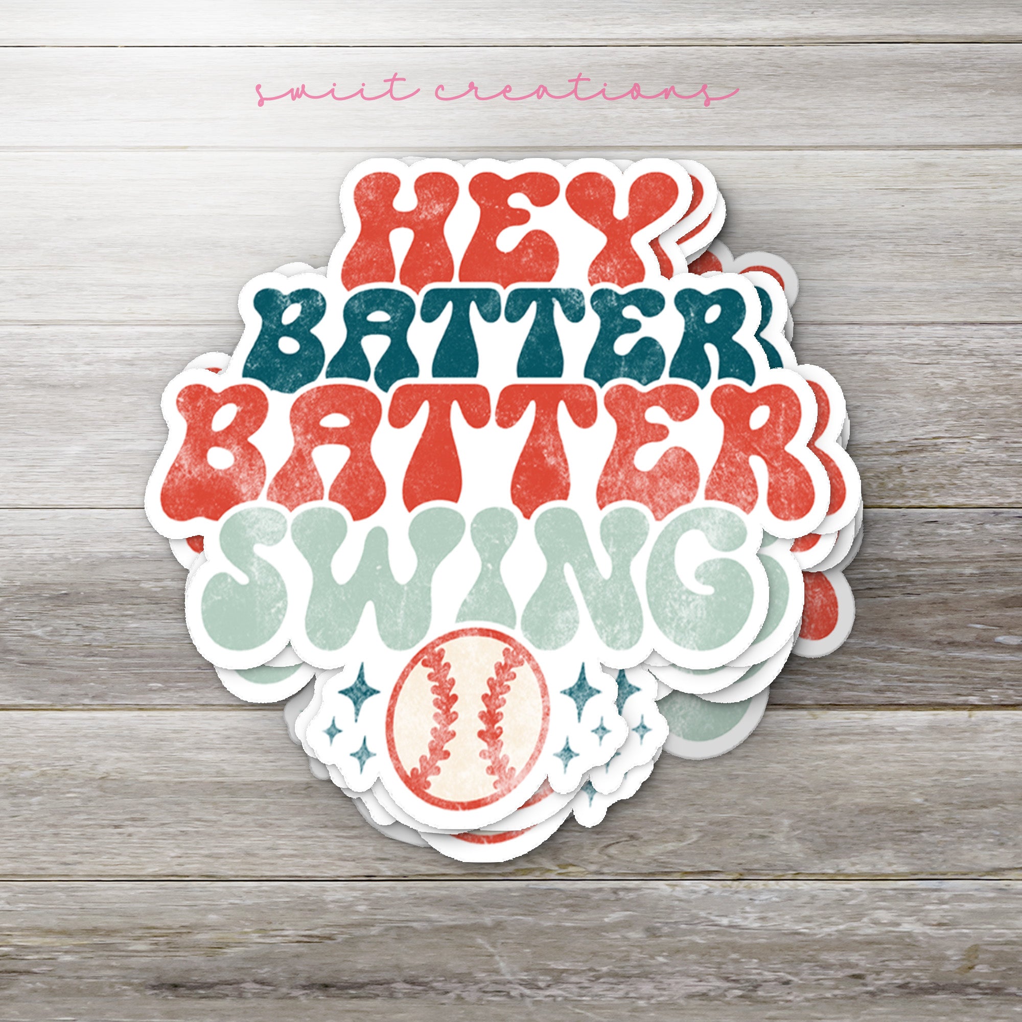 a close up of a sticker on a wooden surface