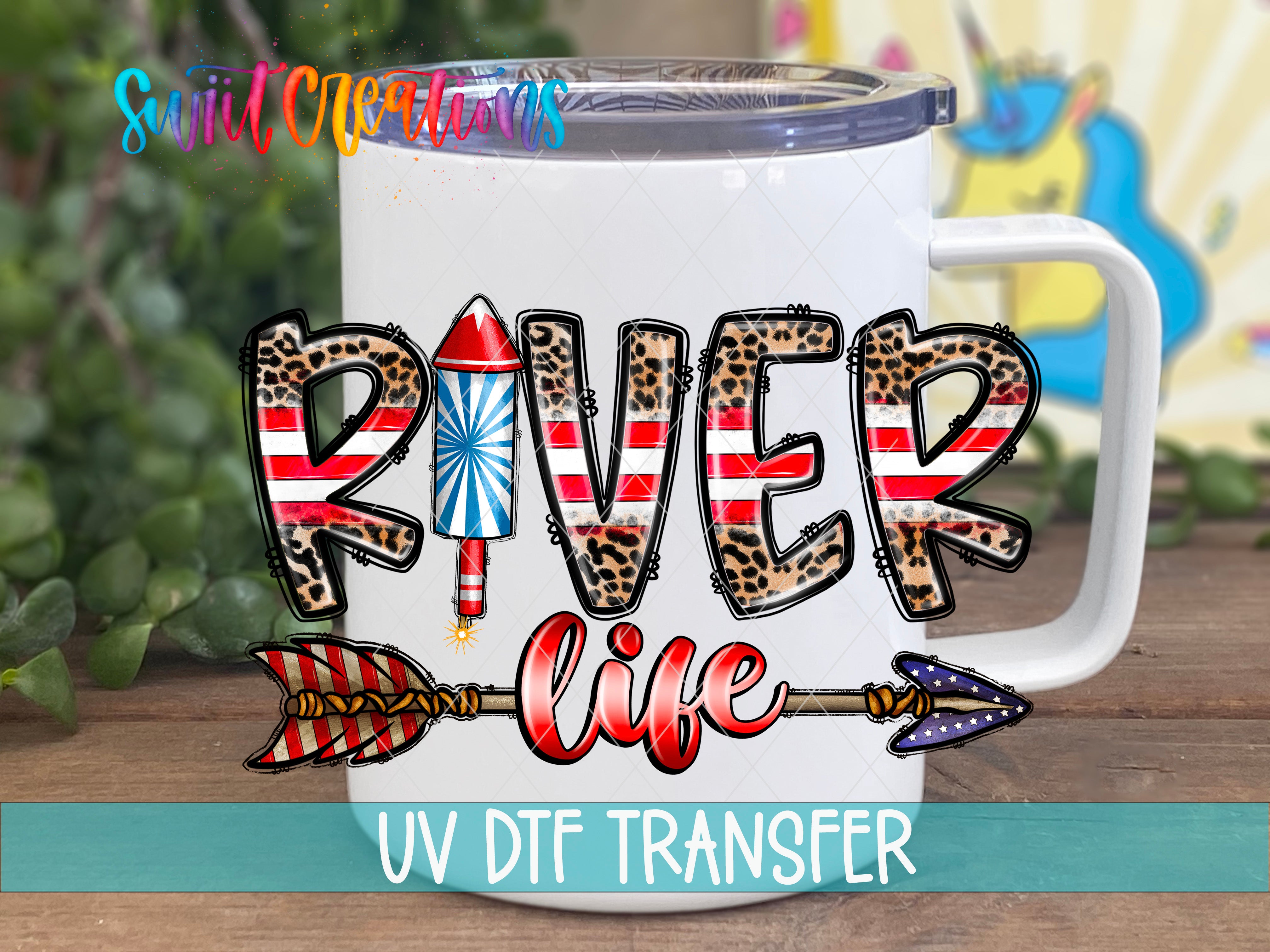 A white mug with a colorful design featuring the word "RIVER" and an arrow, along with the text "UV DFT TRANSFER".