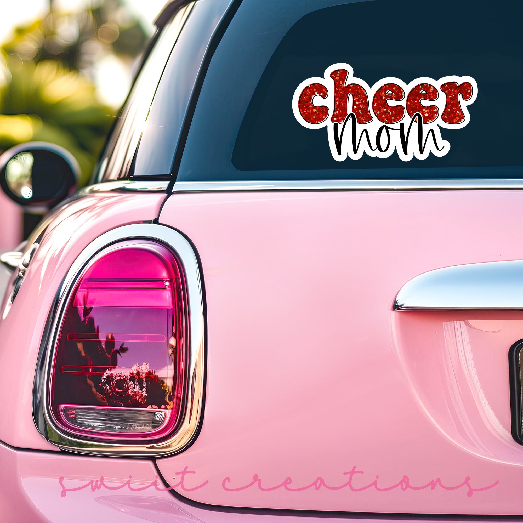 a pink car with the word cheer world on it