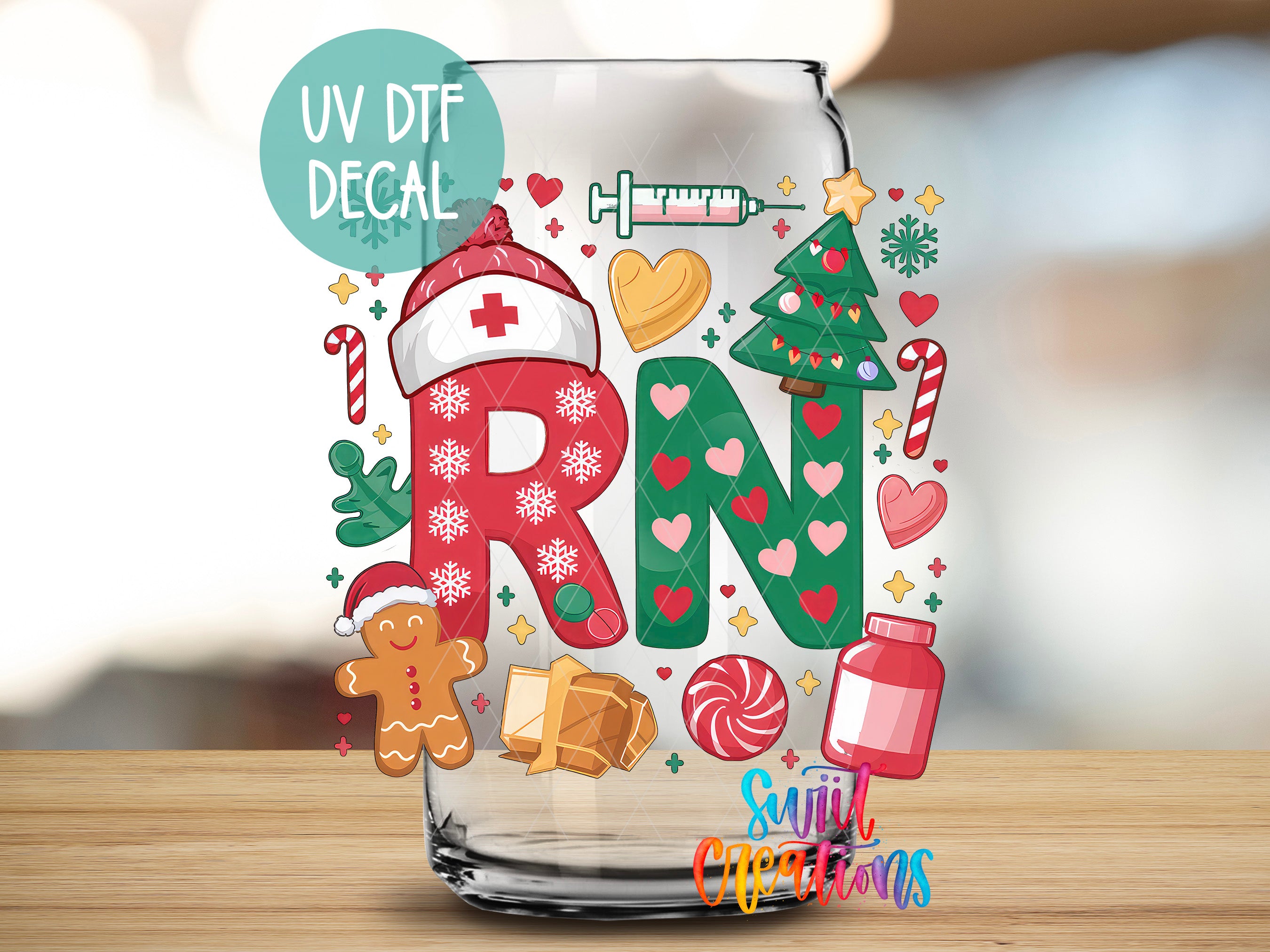 a glass with a christmas themed design on it