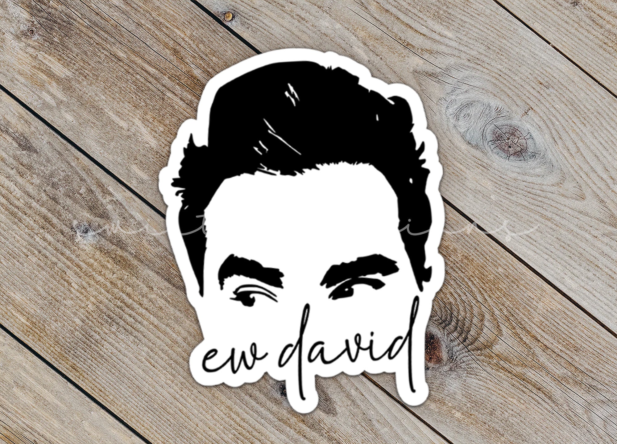 a sticker with a picture of a man's face