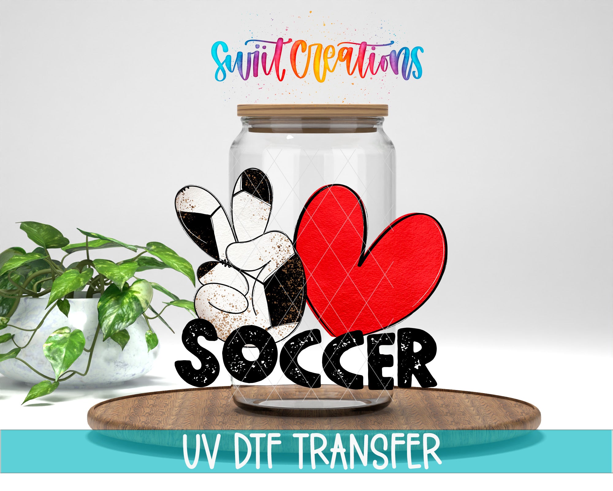 a glass jar with a peace sign and a heart, along with the word "SOCcer" written on it. The jar is placed on a wooden surface, and there is a potted plant in the background.