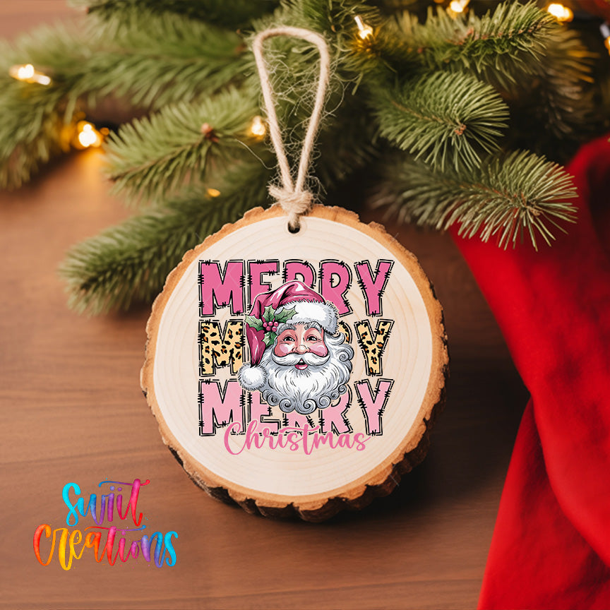 A wooden ornament with a Santa Claus image and the text "MERRY MERRY CHRISTMAS" hanging on a Christmas tree.