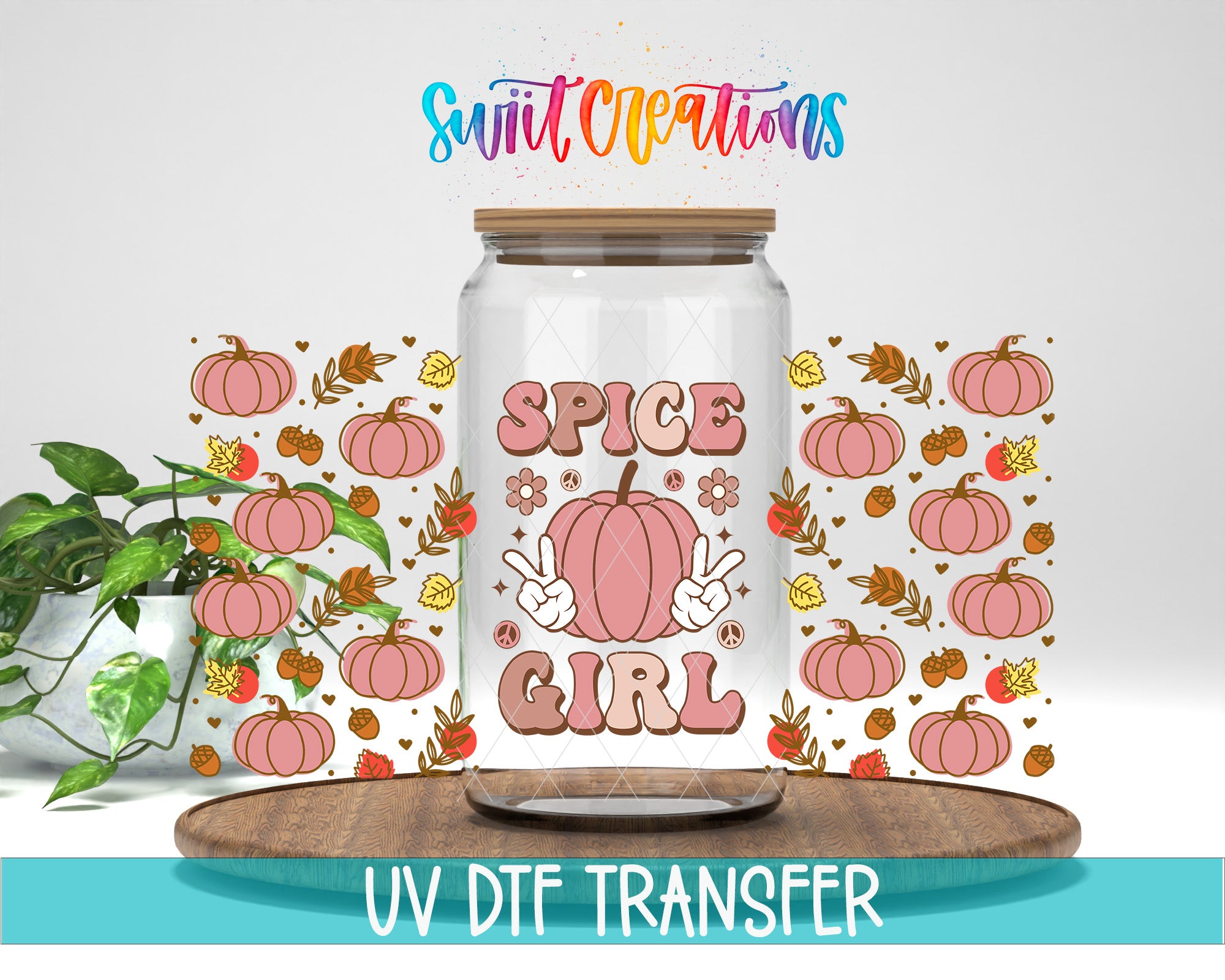 a glass jar with a label that says "SPICE GIRL" surrounded by various fall-themed graphics, including pumpkins, leaves, and acorns. The jar is placed on a wooden surface, and there is a potted plant in the background.