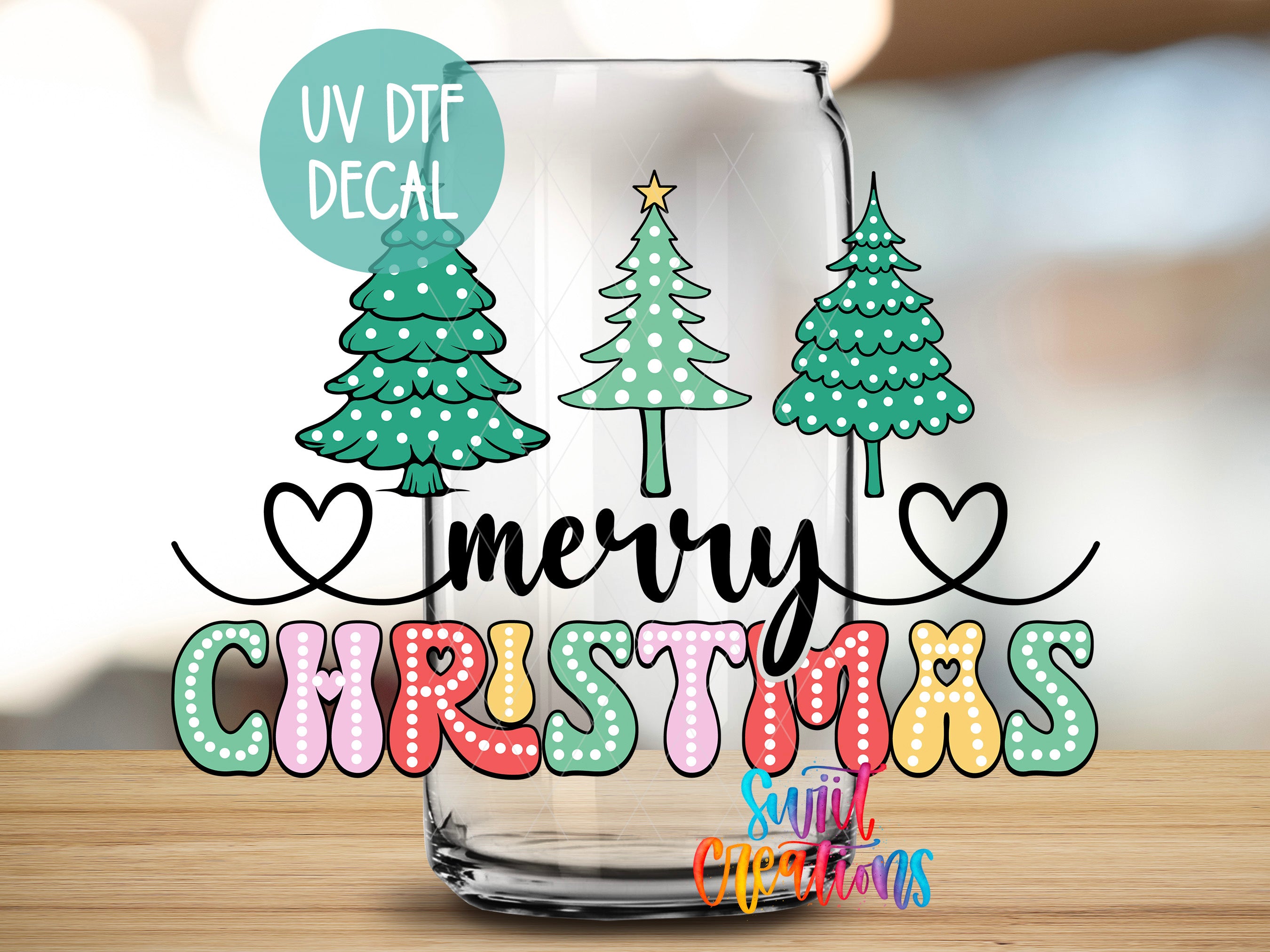 A glass jar with a UV decal featuring a Christmas tree design and the text "Merry Christmas" in a colorful, stylized font.