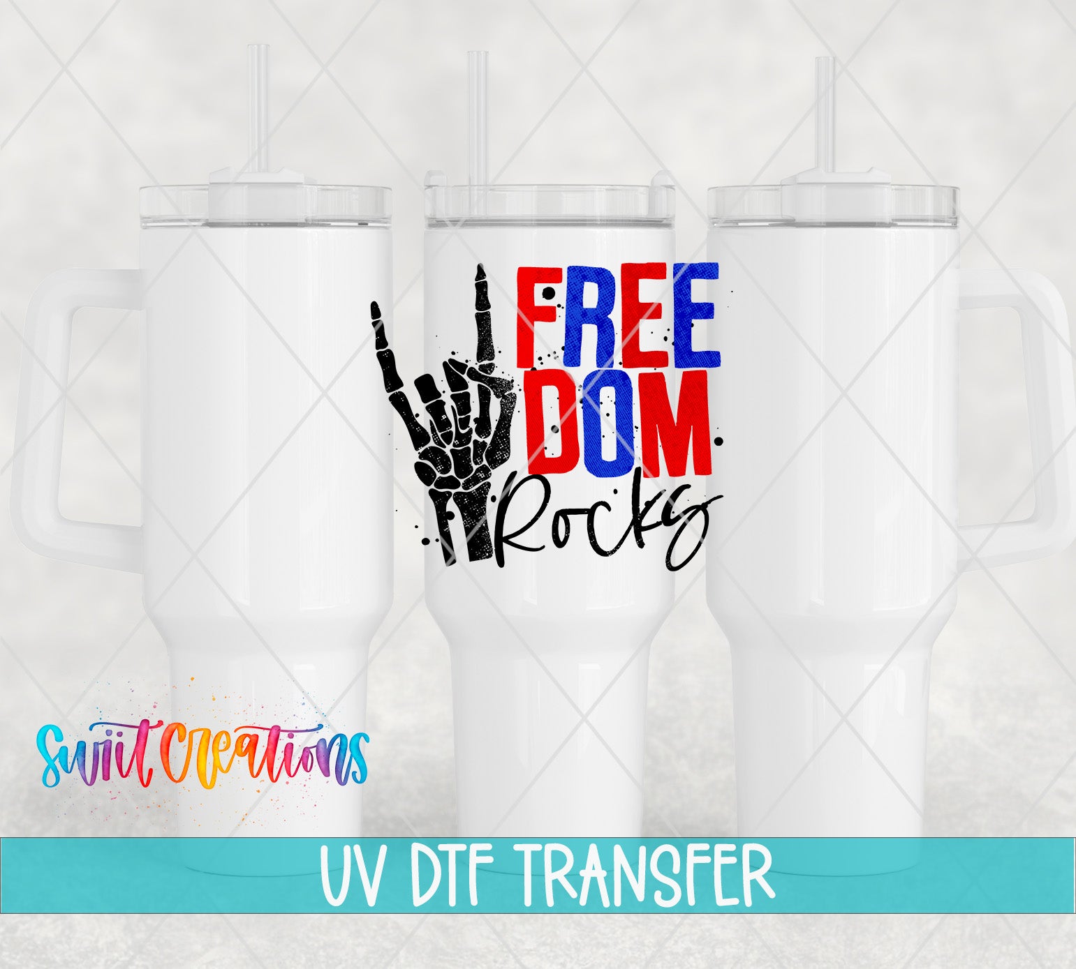 three white tumblers with a graphic design on them, including a hand making a "Free Dom Rocks" sign. The text "UV DFT TRANSFER" is displayed below the tumblers.