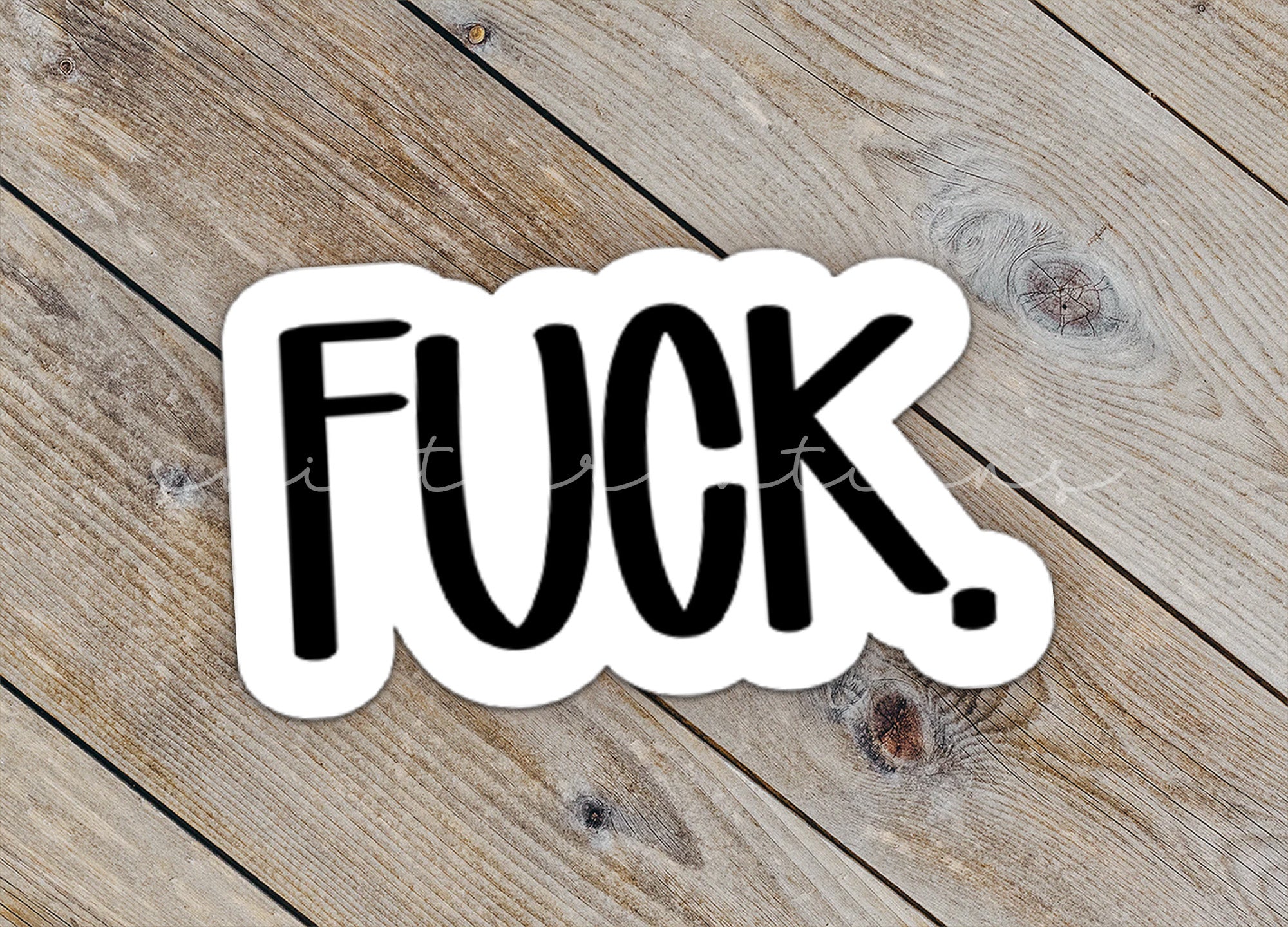 a sticker with the word fok on it