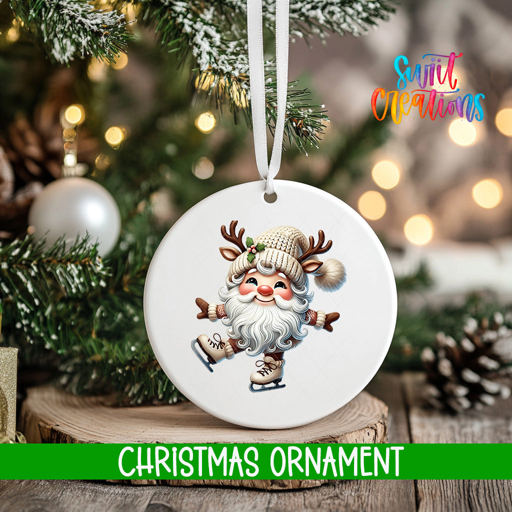 A white Christmas ornament featuring a smiling Santa Claus with antlers is hanging from a tree branch, surrounded by pine cones and other holiday decorations.